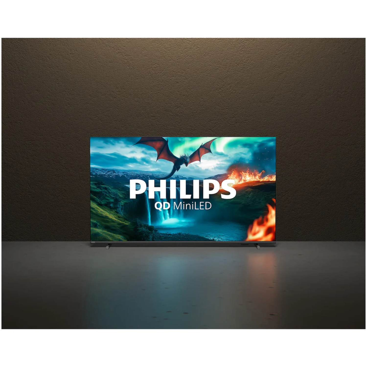 Un téléviseur Philips affiche un dragon, du feu et une cascade.