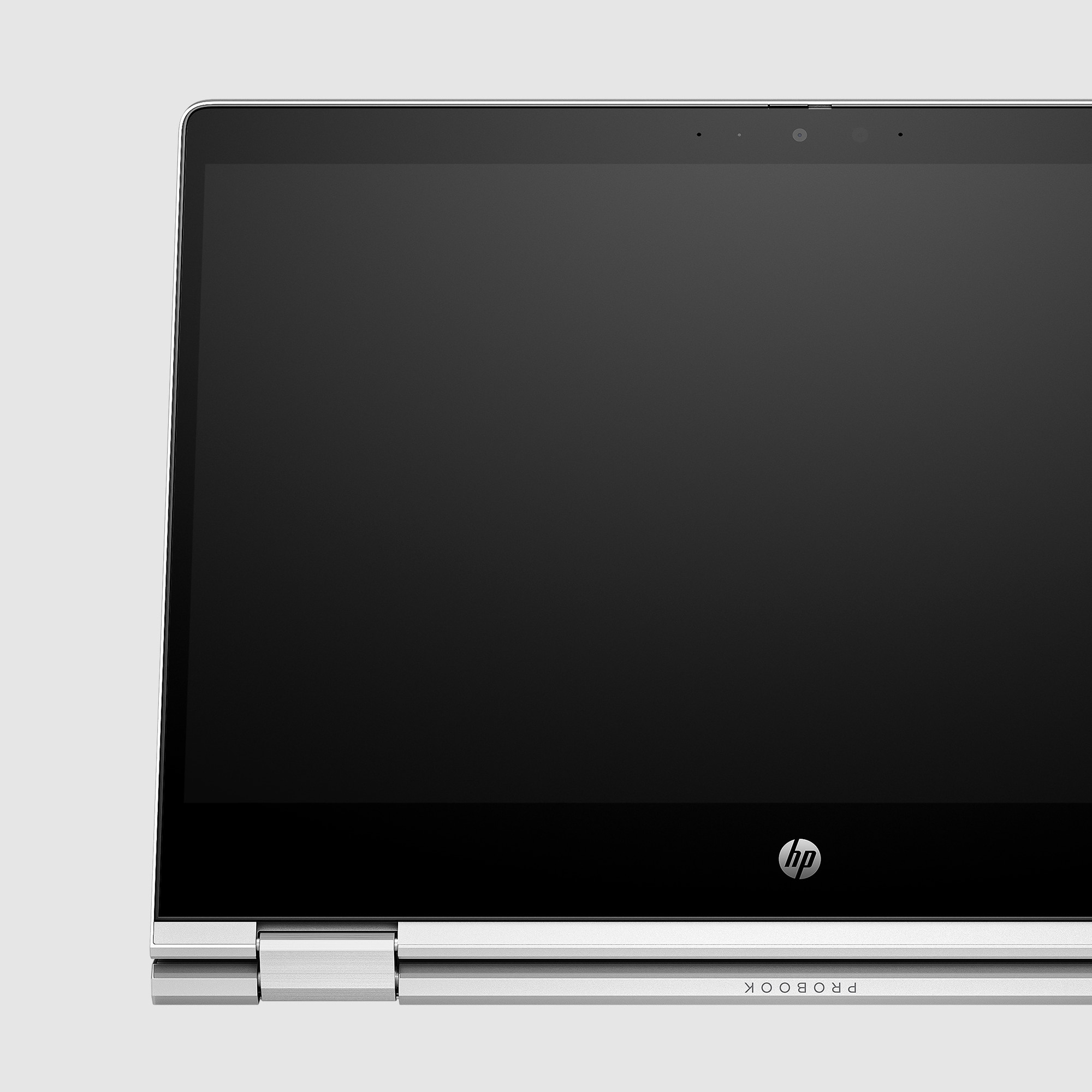 Laptop-Bildschirmecke mit HP-Logo.