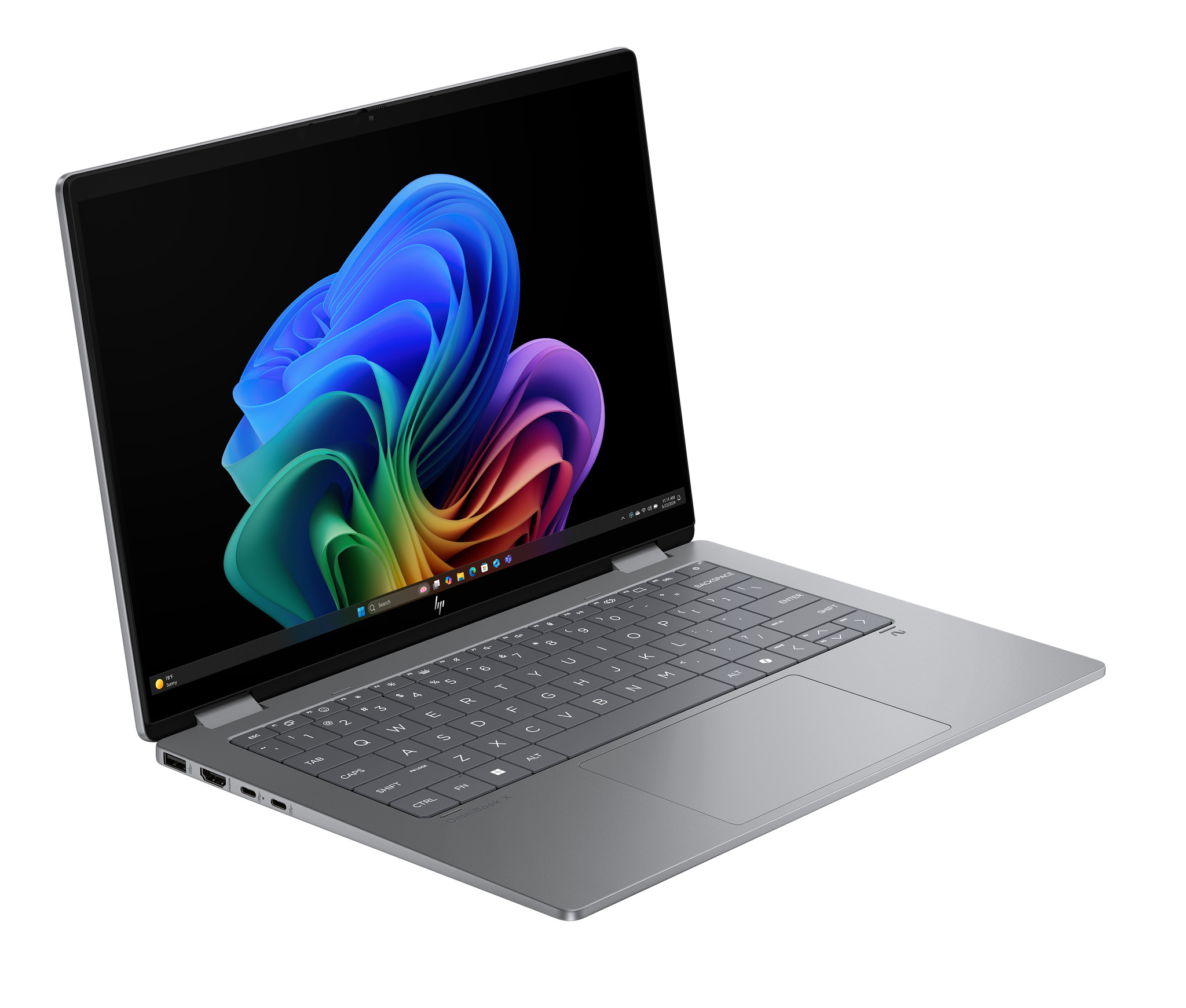 Silberner Laptop offen, zeigt ein farbenfrohes Blumendesign auf dem Bildschirm.