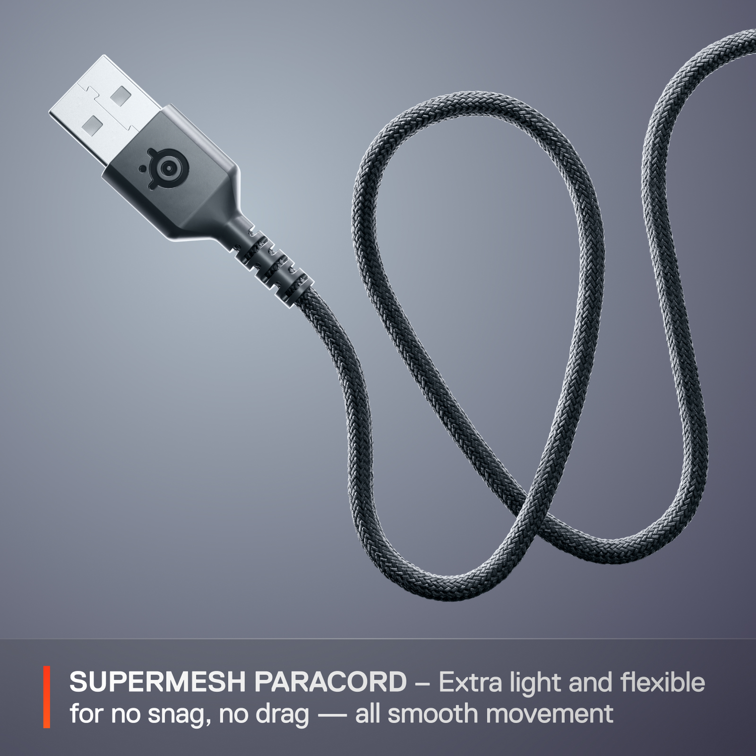 Close-up of a USB cable with the SteelSeries logo and text about the cord.
