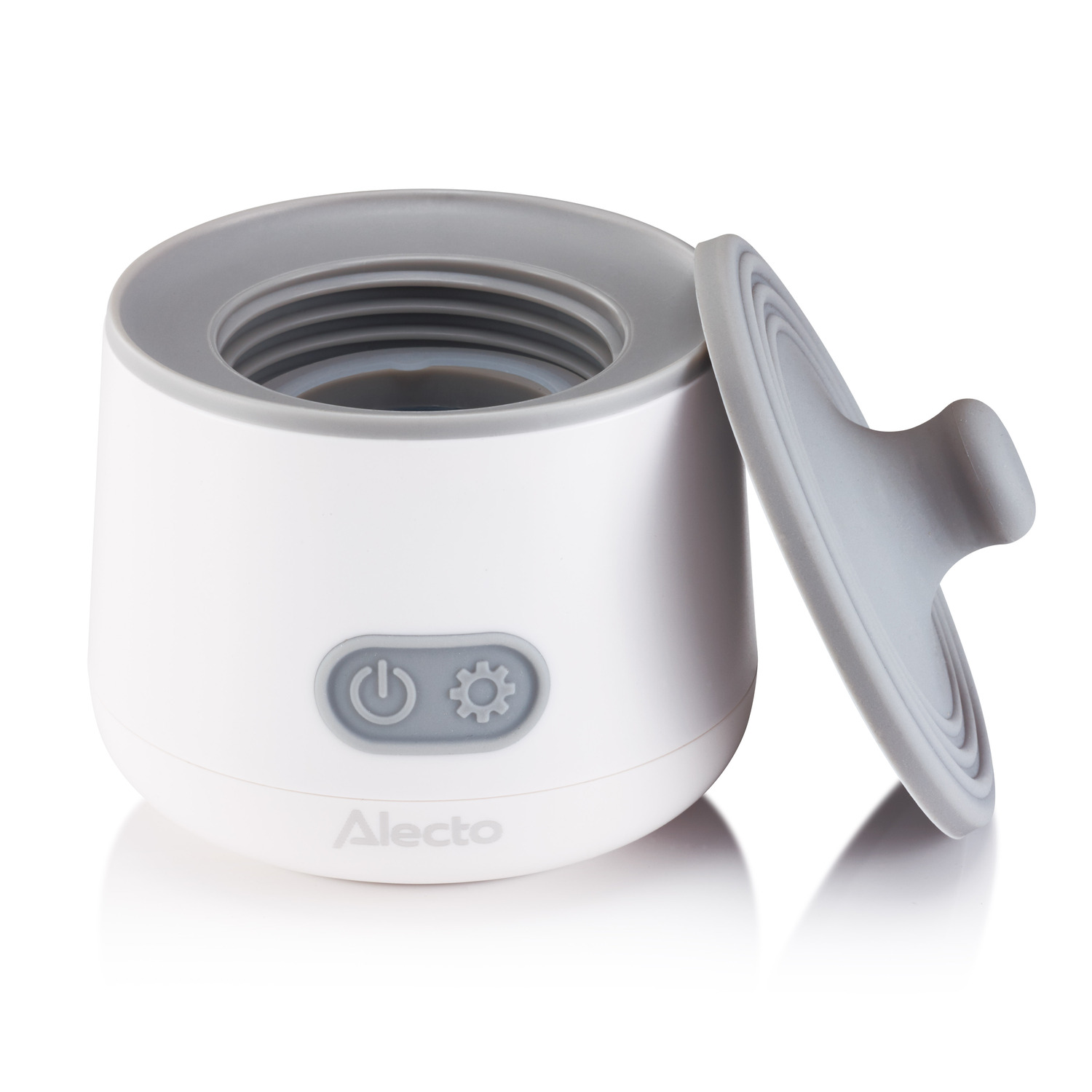 White baby bottle warmer with the lid open. Grey lid and white background.
