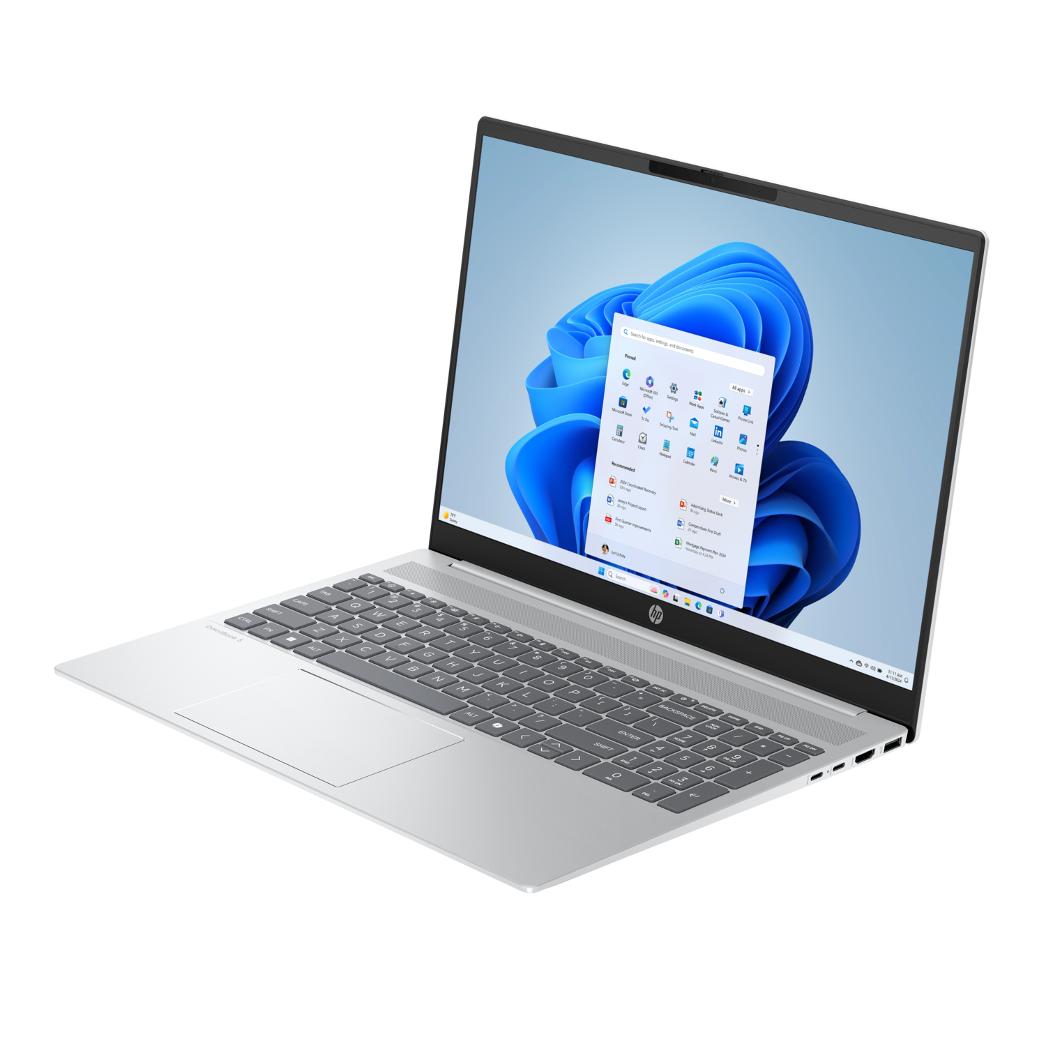 Zilveren laptop in een hoek, met de Windows 11-interface.