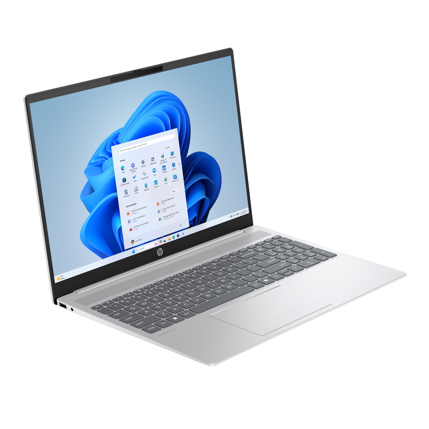 Zilveren laptop in een hoek, met de Windows 11-interface op het scherm.