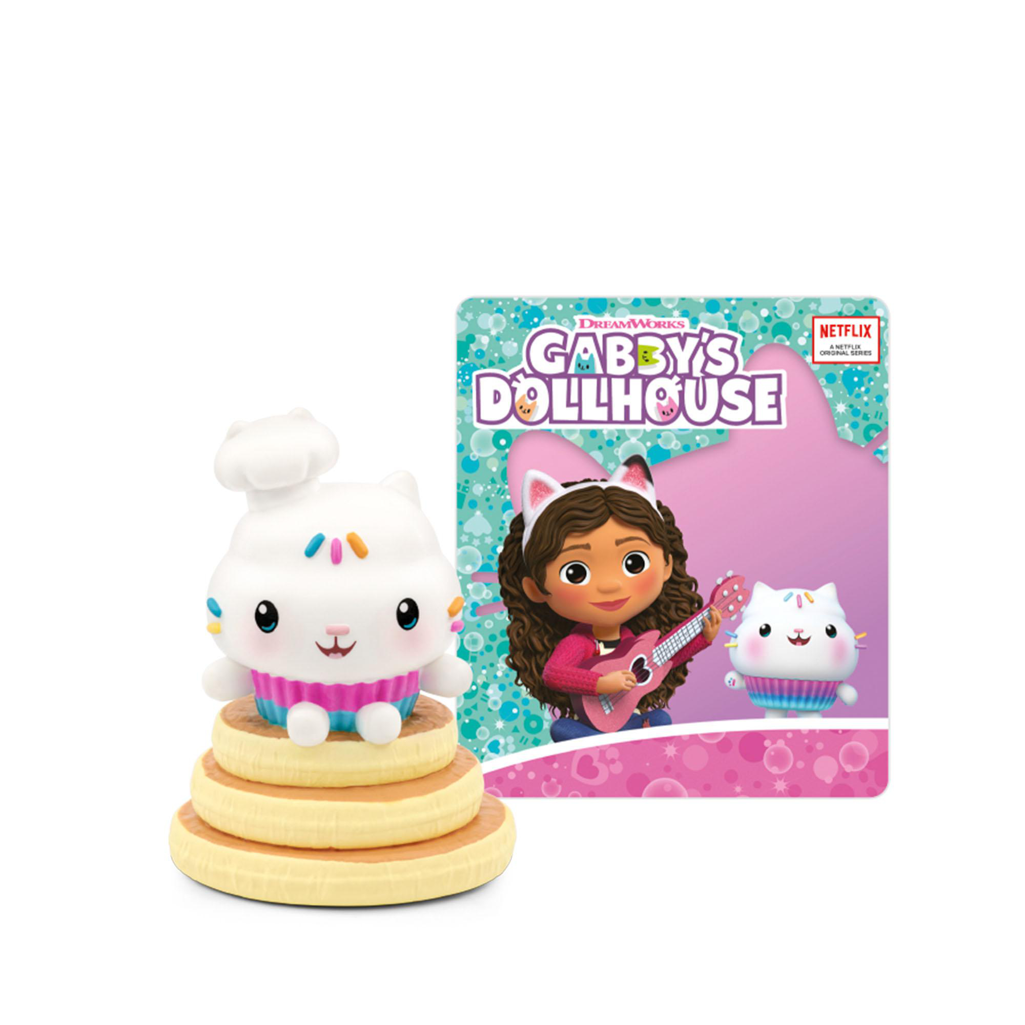 Eine Cupcake-Katzenfigur und ein Cartoon-Mädchen mit Gitarre, auf farbenfrohem Hintergrund.