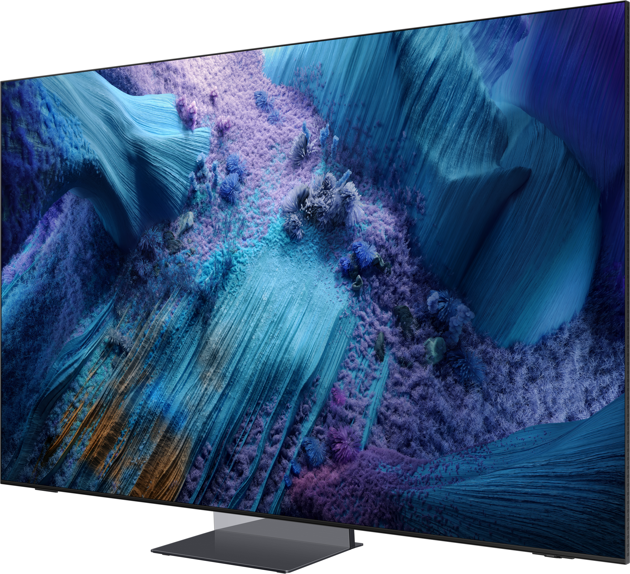 Una grande TV mostra un paesaggio astratto colorato. La scena è per lo più blu.