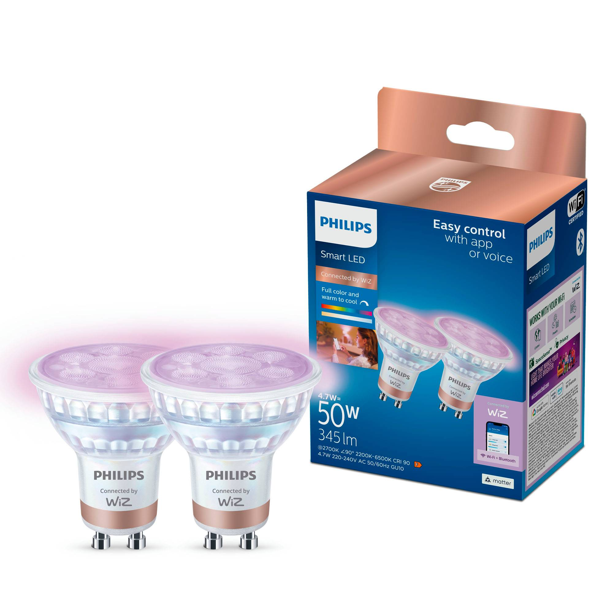 Dos bombillas LED inteligentes Philips en un paquete. Las bombillas son moradas. Se ven las características y especificaciones del paquete.