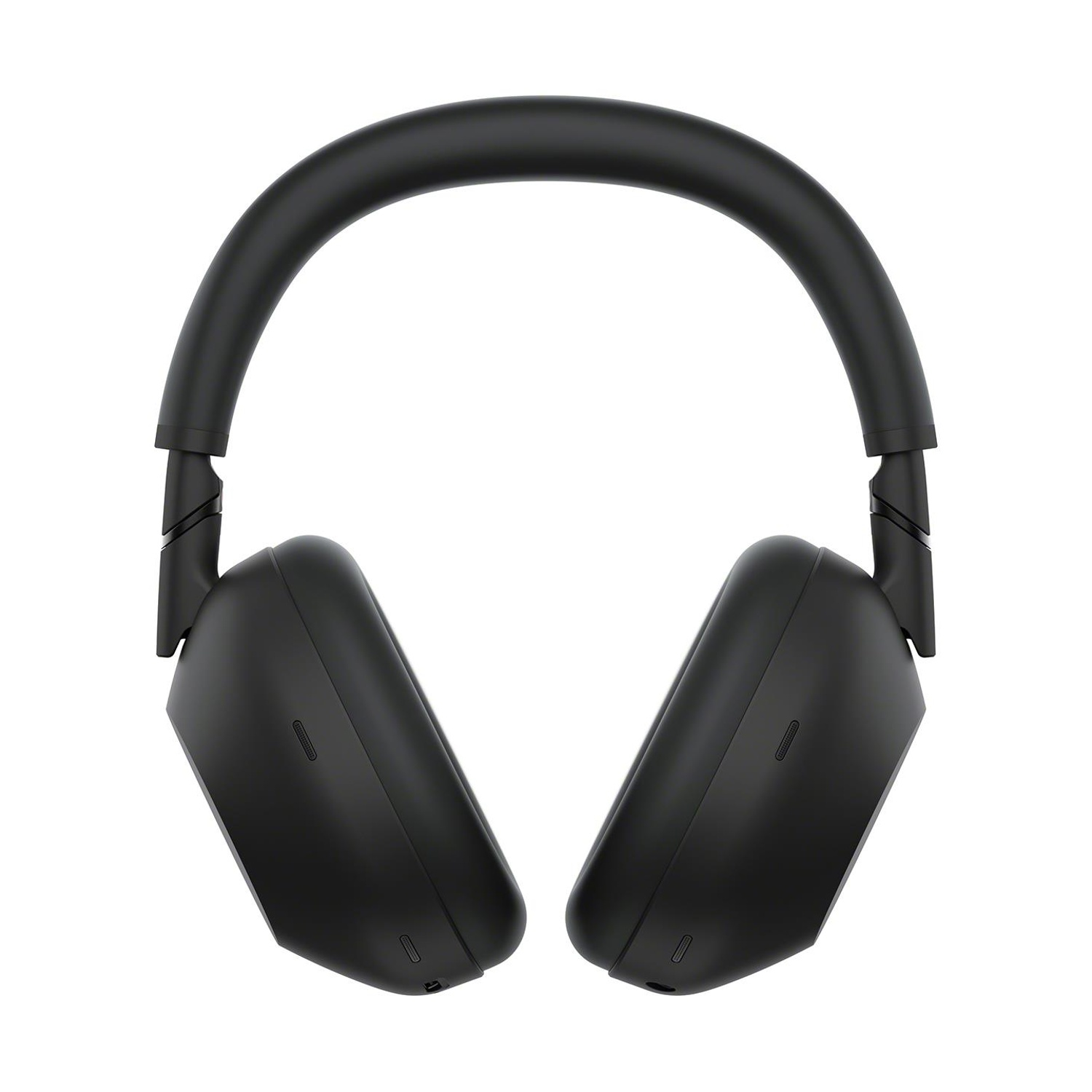 Cuffie nere, vista dall'alto. I cuscinetti auricolari sono visibili. Testo: WH-1000XM6.