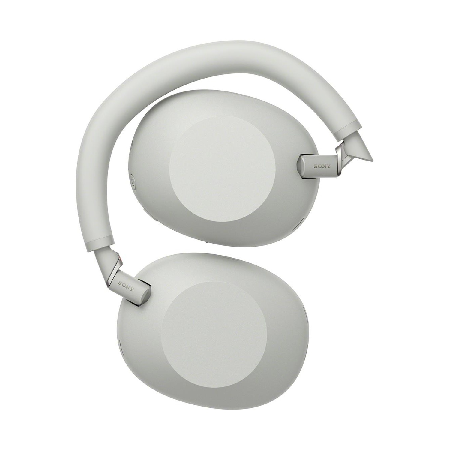 Cuffie Sony grigie piegate. Vista laterale, padiglioni e archetto visibili, sfondo bianco.
