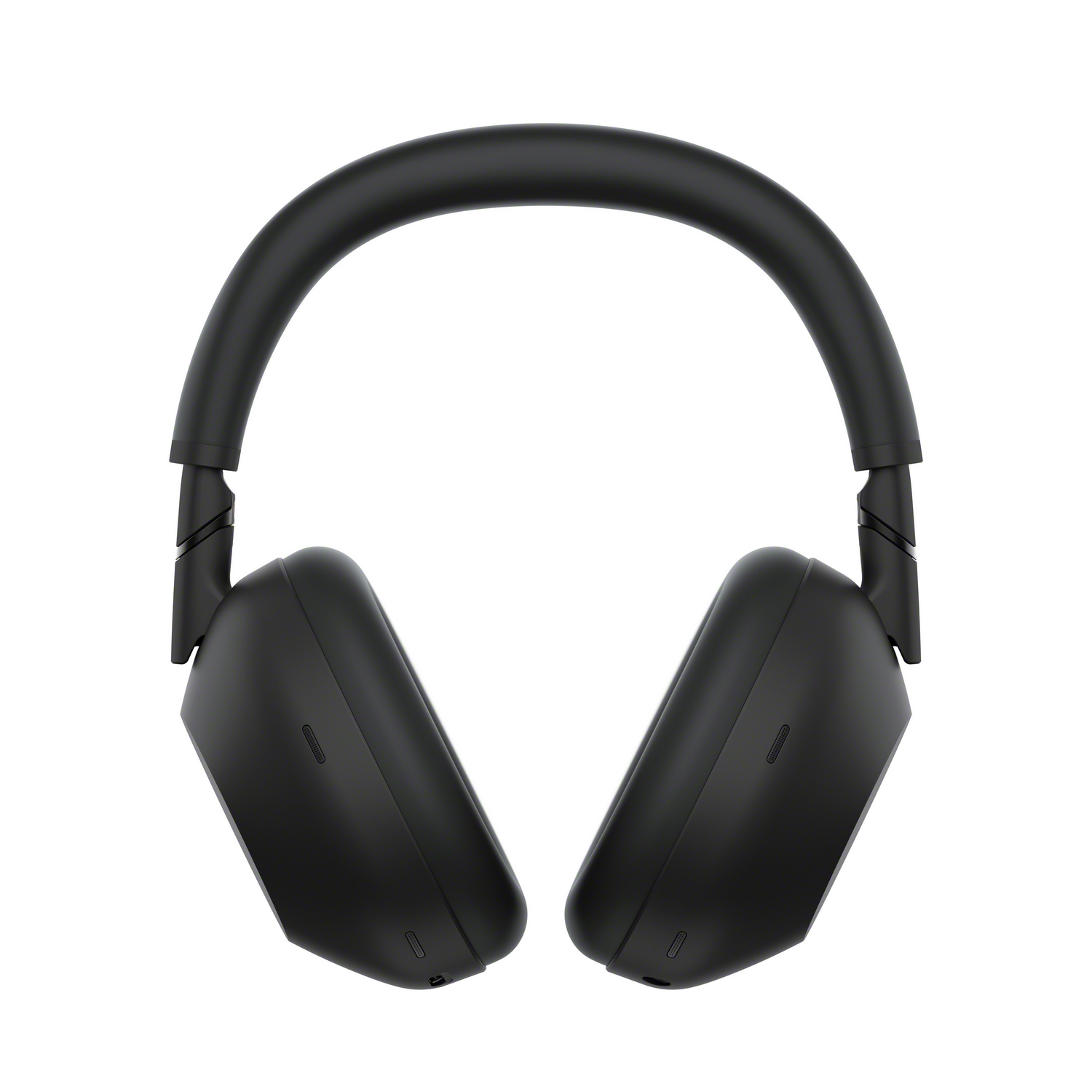 Vista frontal de auriculares negros, mostrando las copas y el diseño de la diadema.