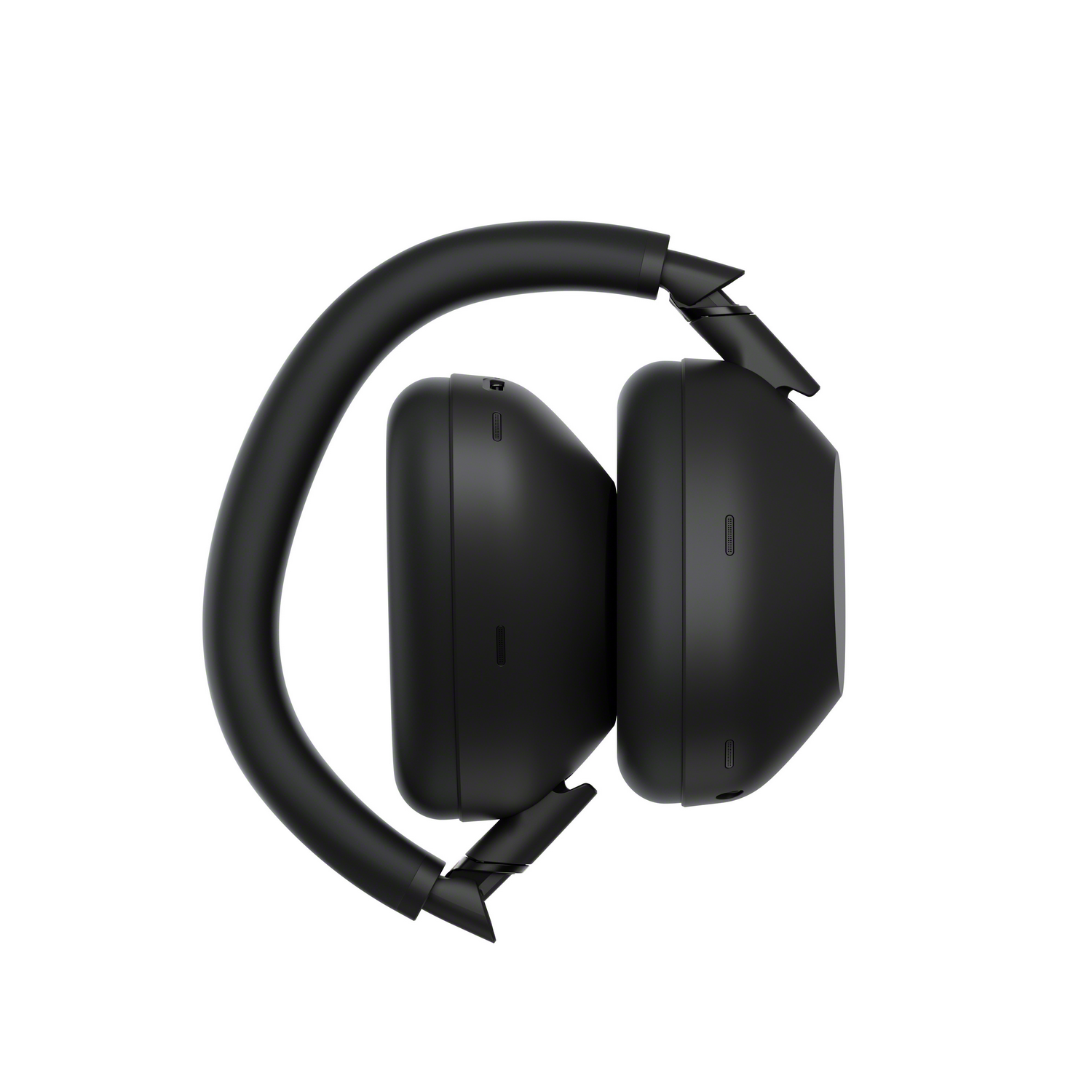 Auriculares circumaurales negros plegados. Los auriculares se enfrentan. Diseño elegante.