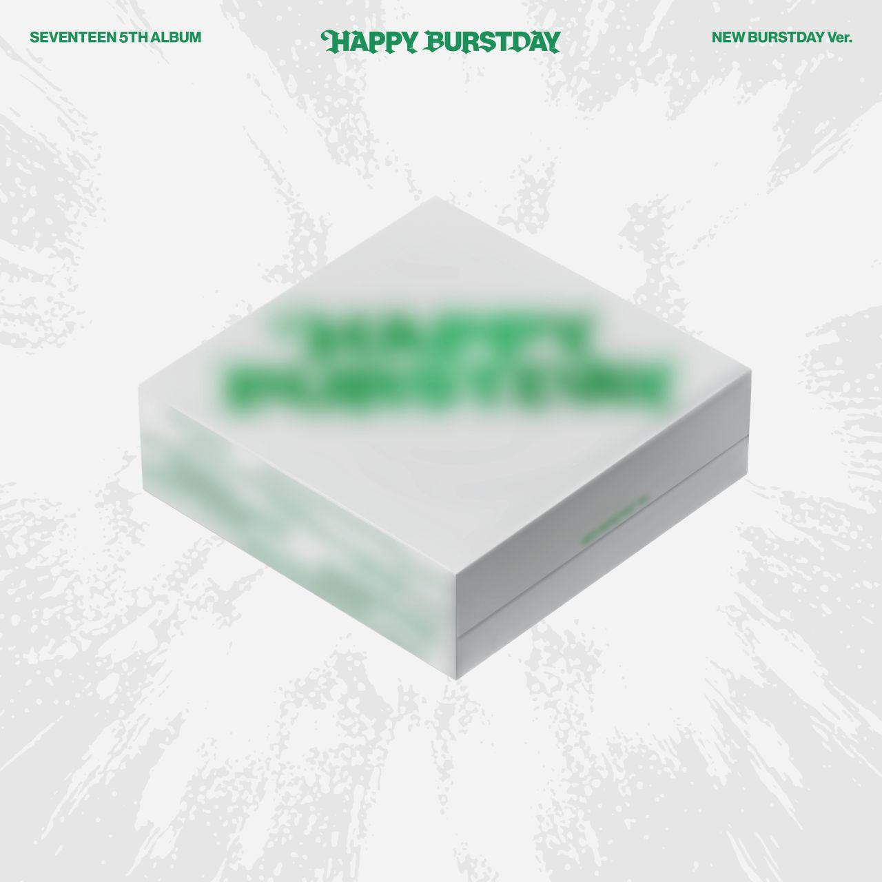 Witte doos met groene, wazige tekst. 'HAPPY BURSTDAY' staat erop geschreven.