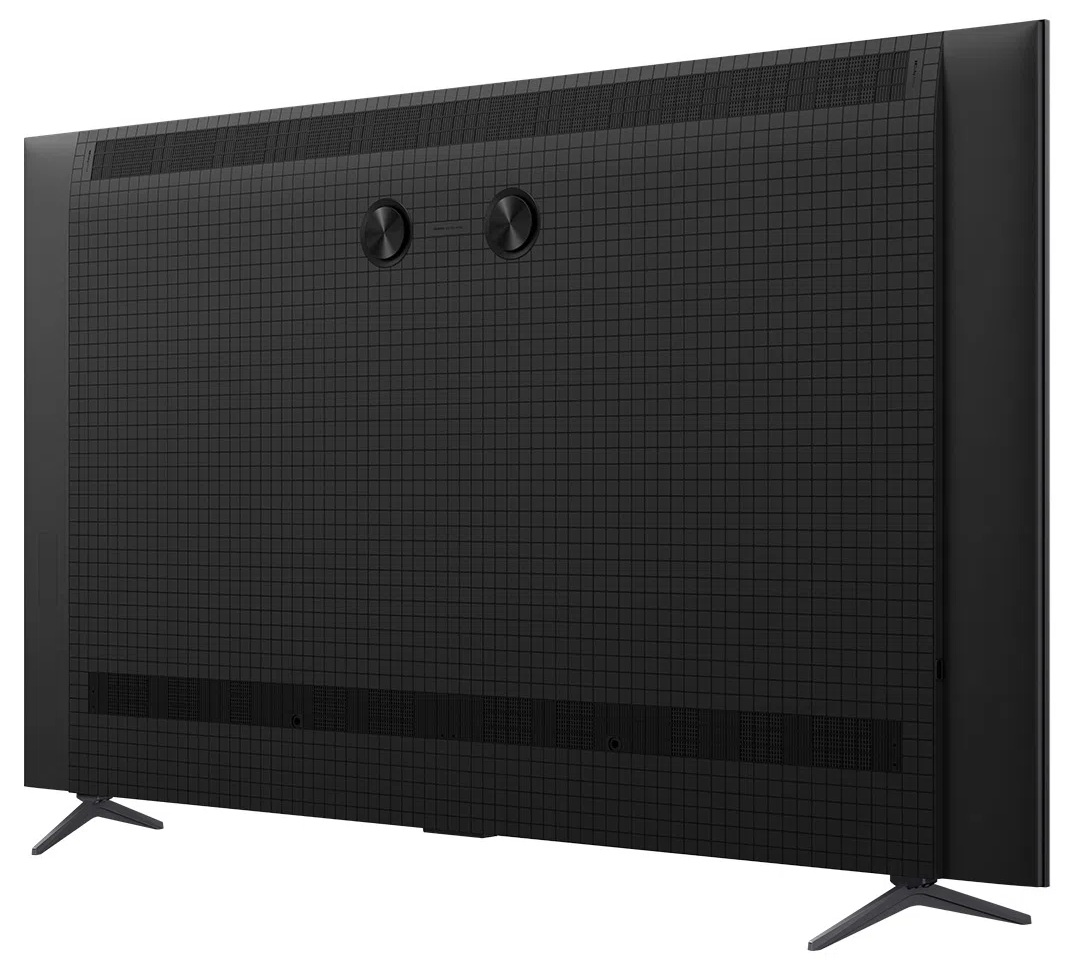 Widok z tyłu czarnego telewizora. Ma wzorzyste plecy i dwa okręgi.