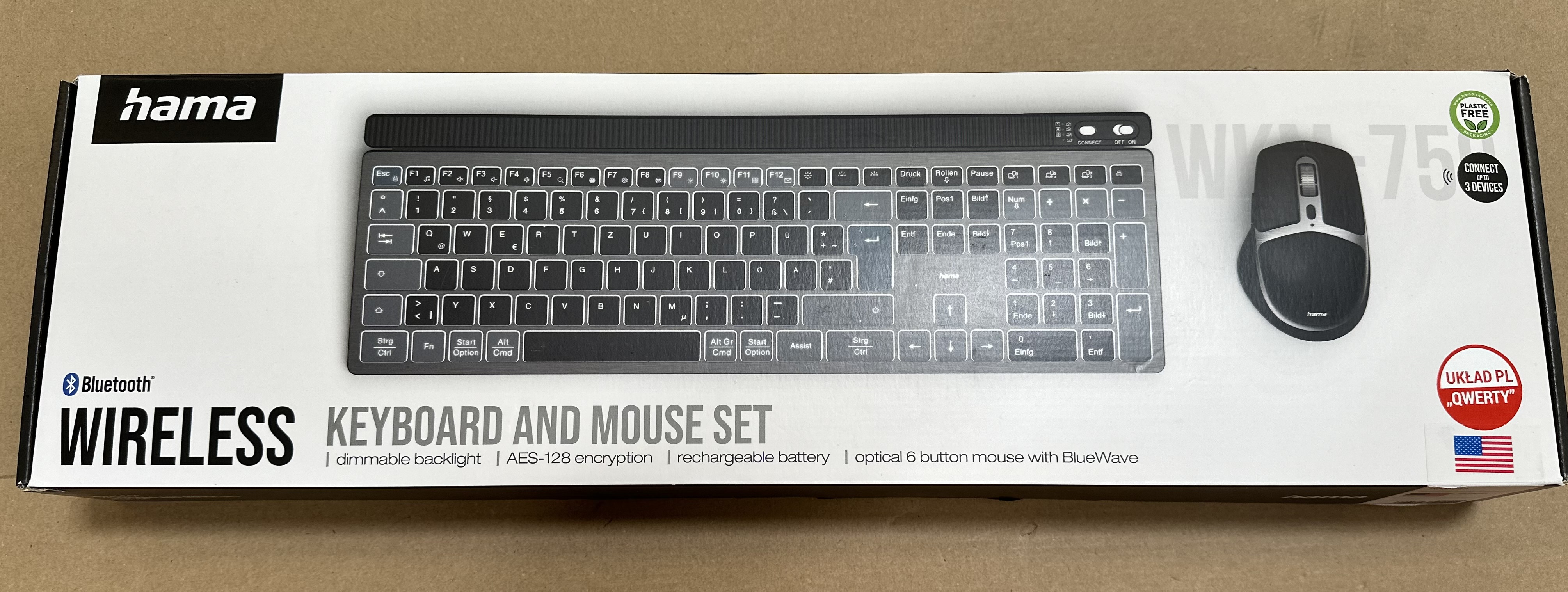 Zestaw klawiatura i mysz w pudełku. Klawiatura jest srebrna, mysz czarna. Tekst: WIRELESS KEYBOARD AND MOUSE SET.