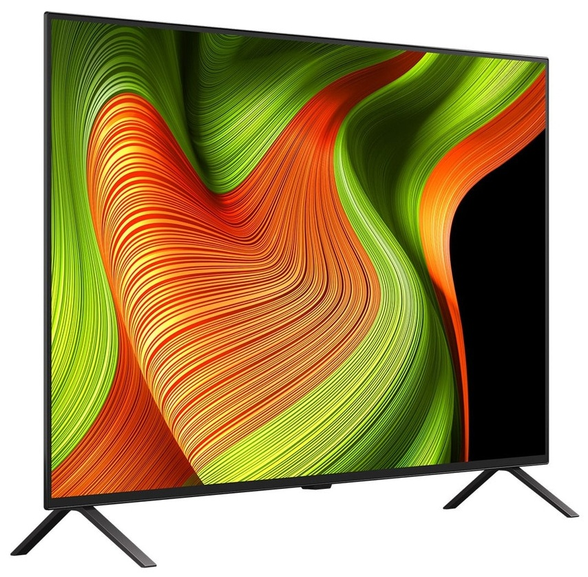 Czarny telewizor wyświetlający kolorowy, abstrakcyjny wzór zielonych, pomarańczowych i żółtych fal na ekranie.