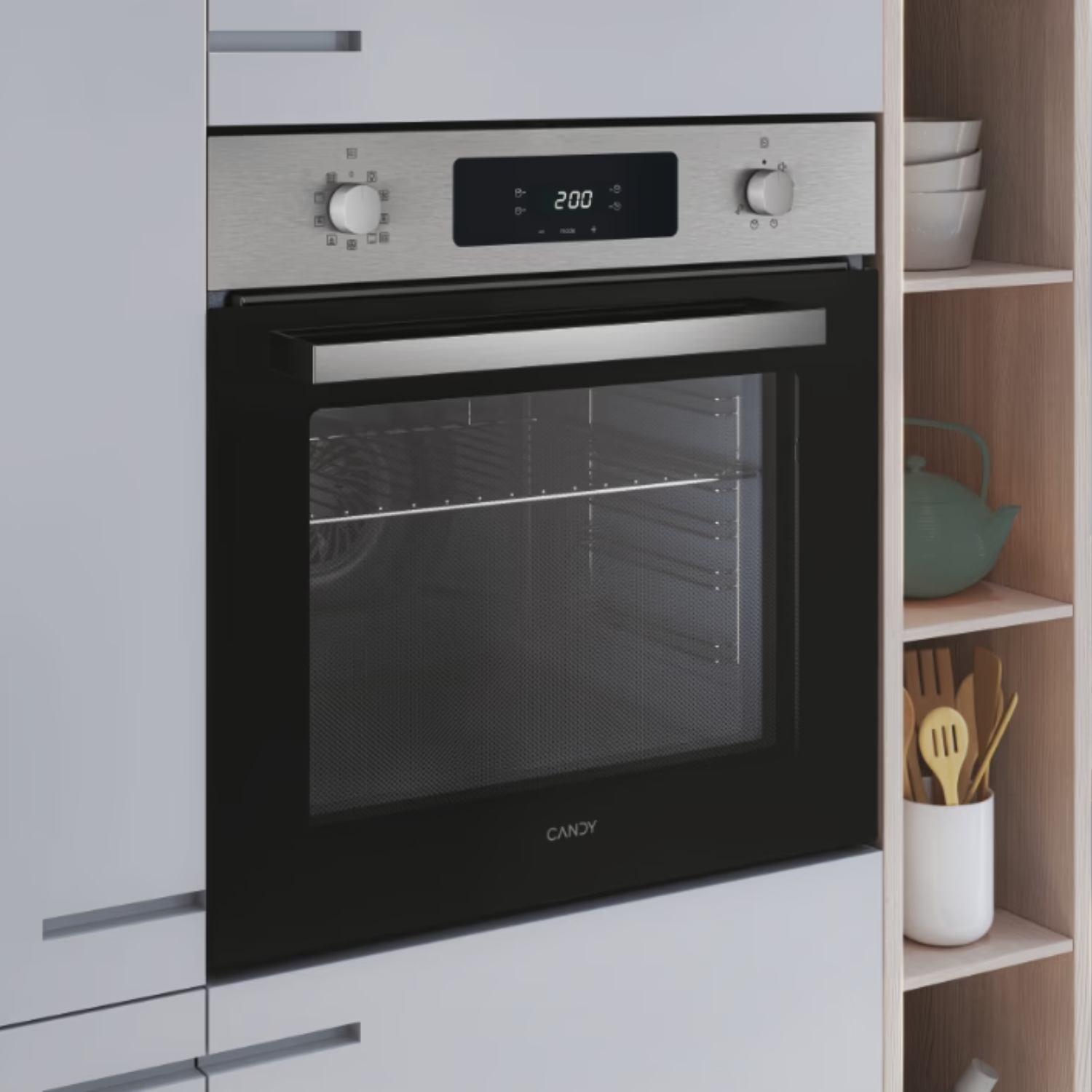 Forno da cucina con porta nera e top in acciaio inox. Ha un display digitale.