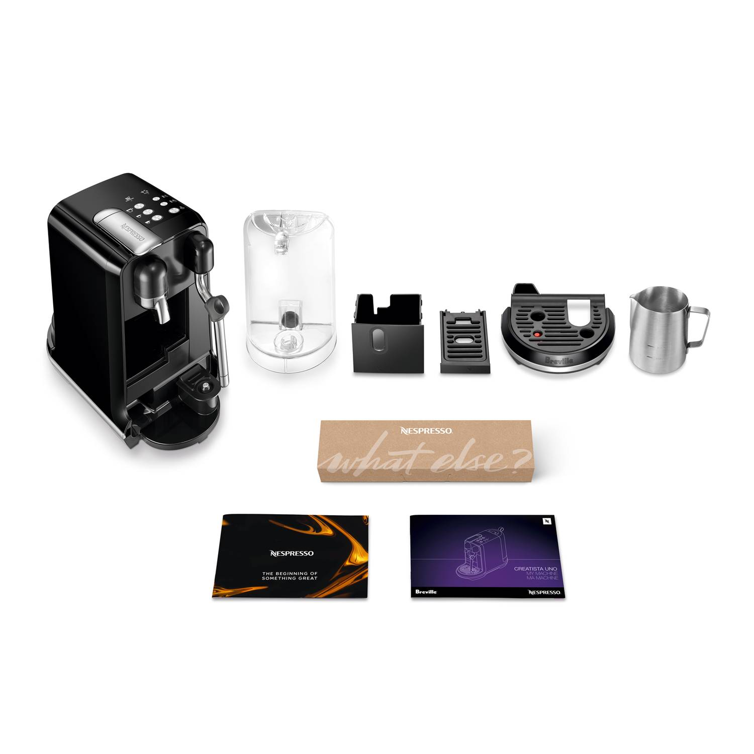 Coffee machine, water tank, parts and manuals are laid out. White background.