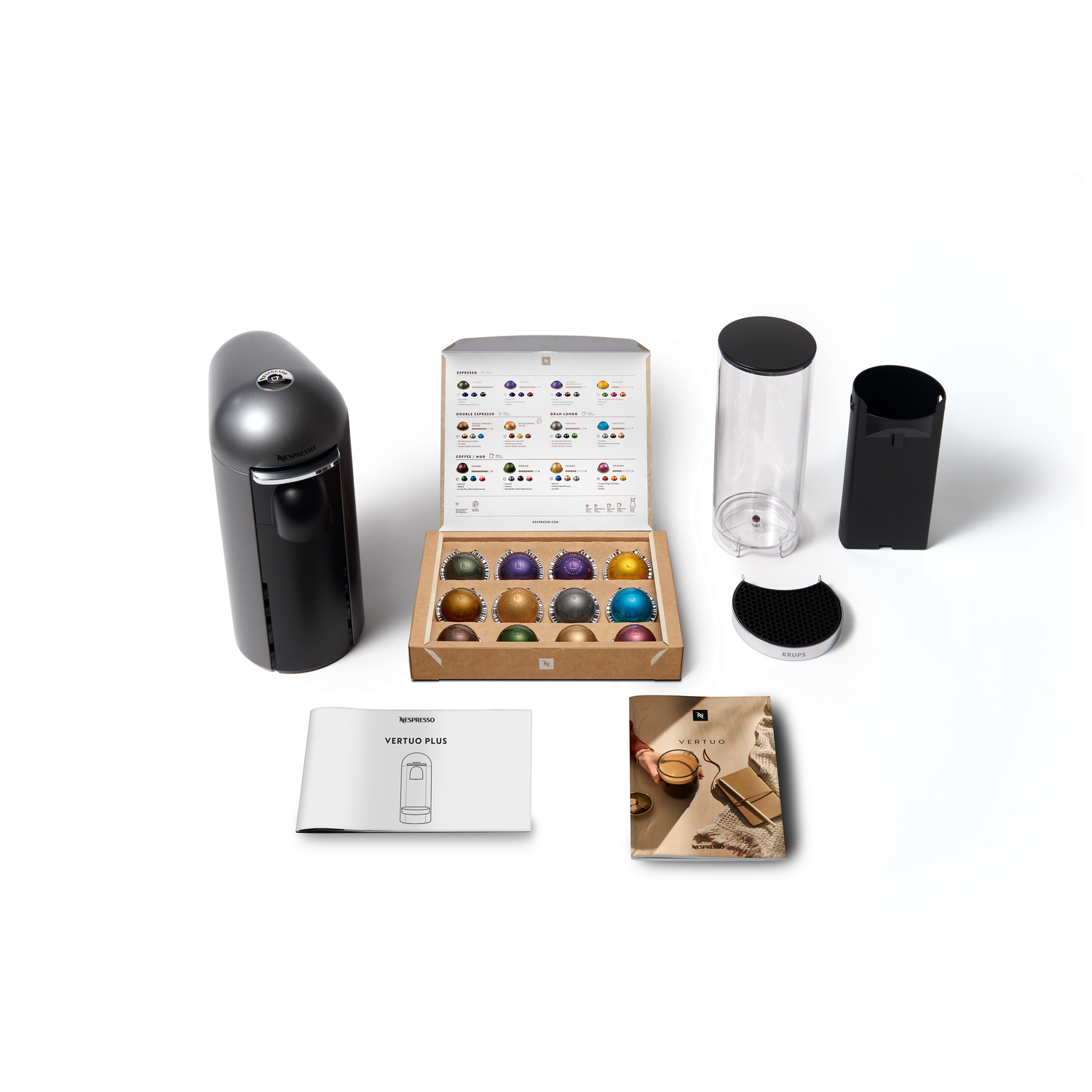 An overhead view of a Nespresso machine, capsules and accessories.