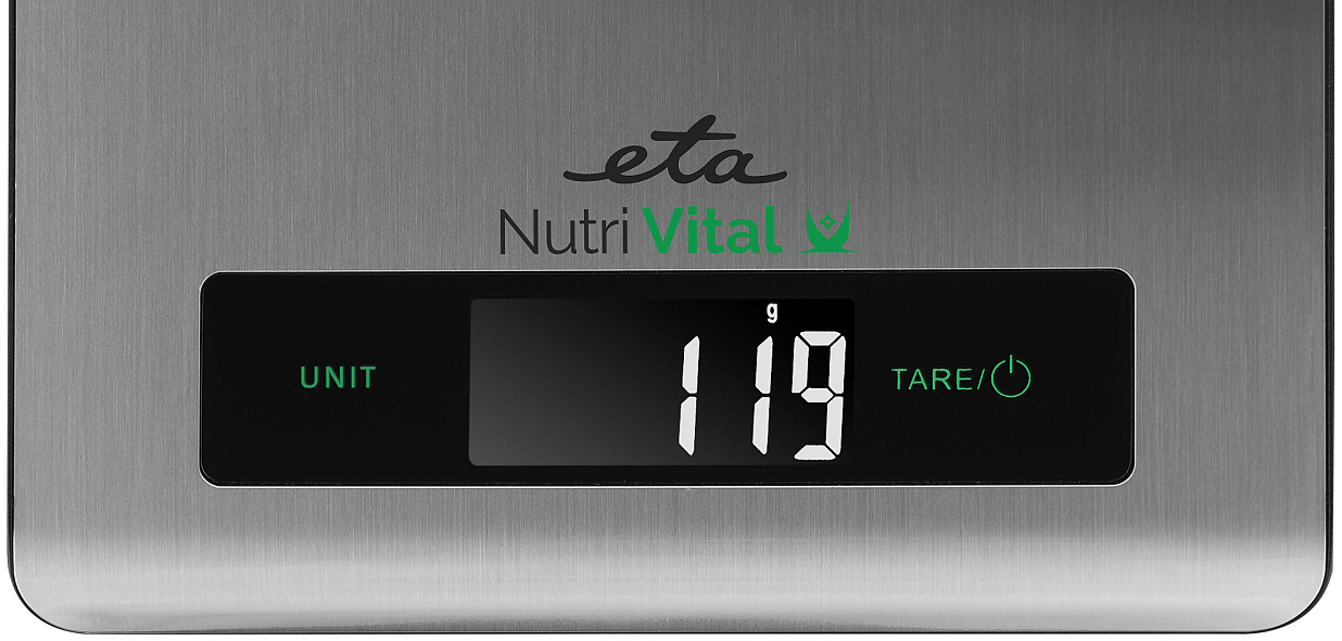 Digitális konyhai mérleg kijelzőjének közelképe. 119g-ot mutat, egység és tára gombok láthatók.