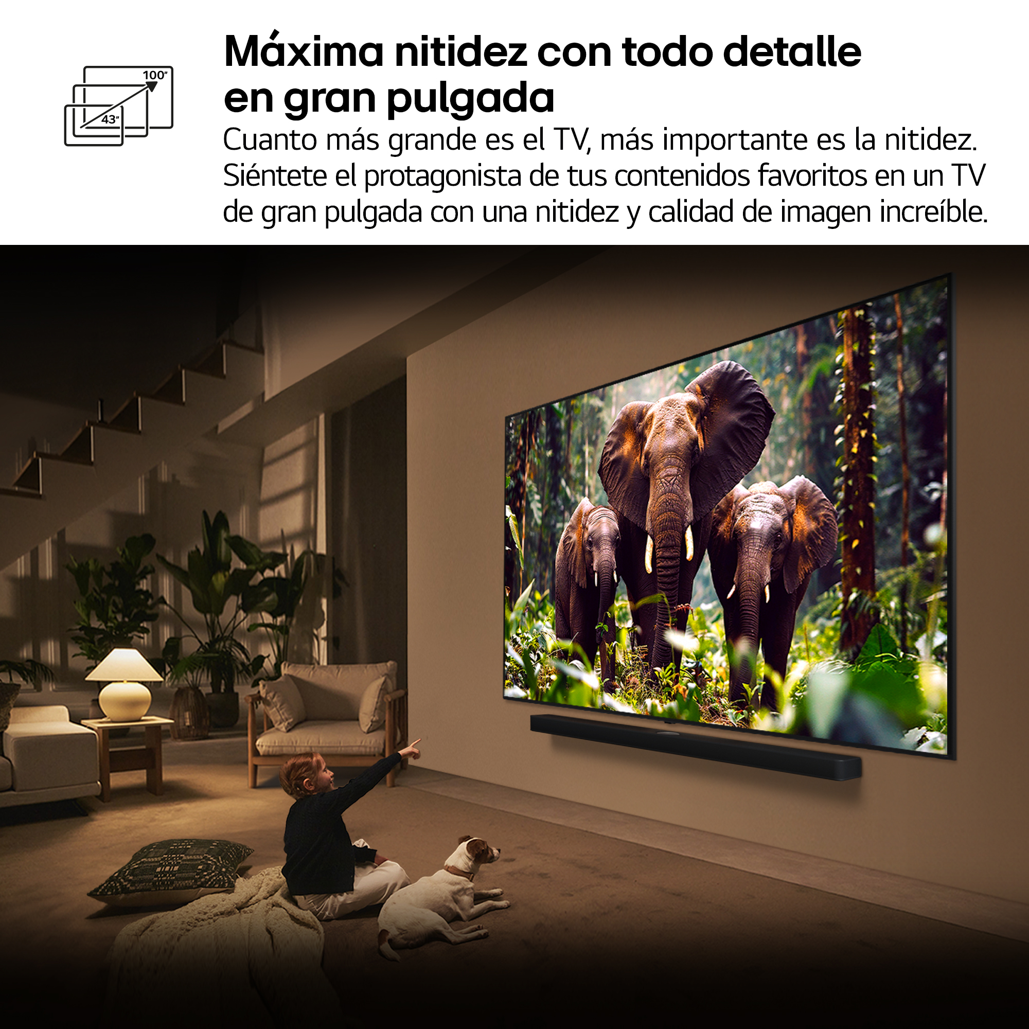 Escena de sala de estar con TV mostrando elefantes, un niño señalando y un perro. Barra de sonido debajo.