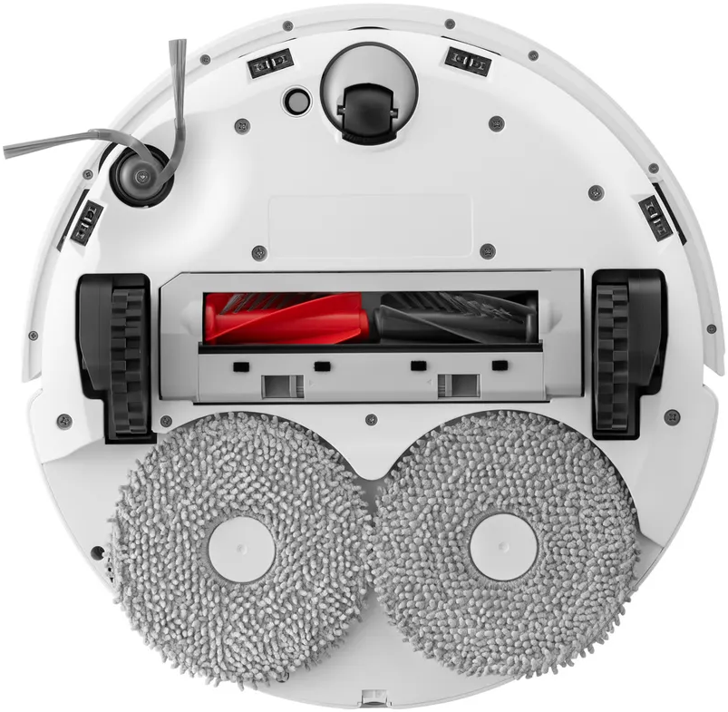 Dessous d'un robot aspirateur blanc. Deux tampons et une brosse rouge visibles.