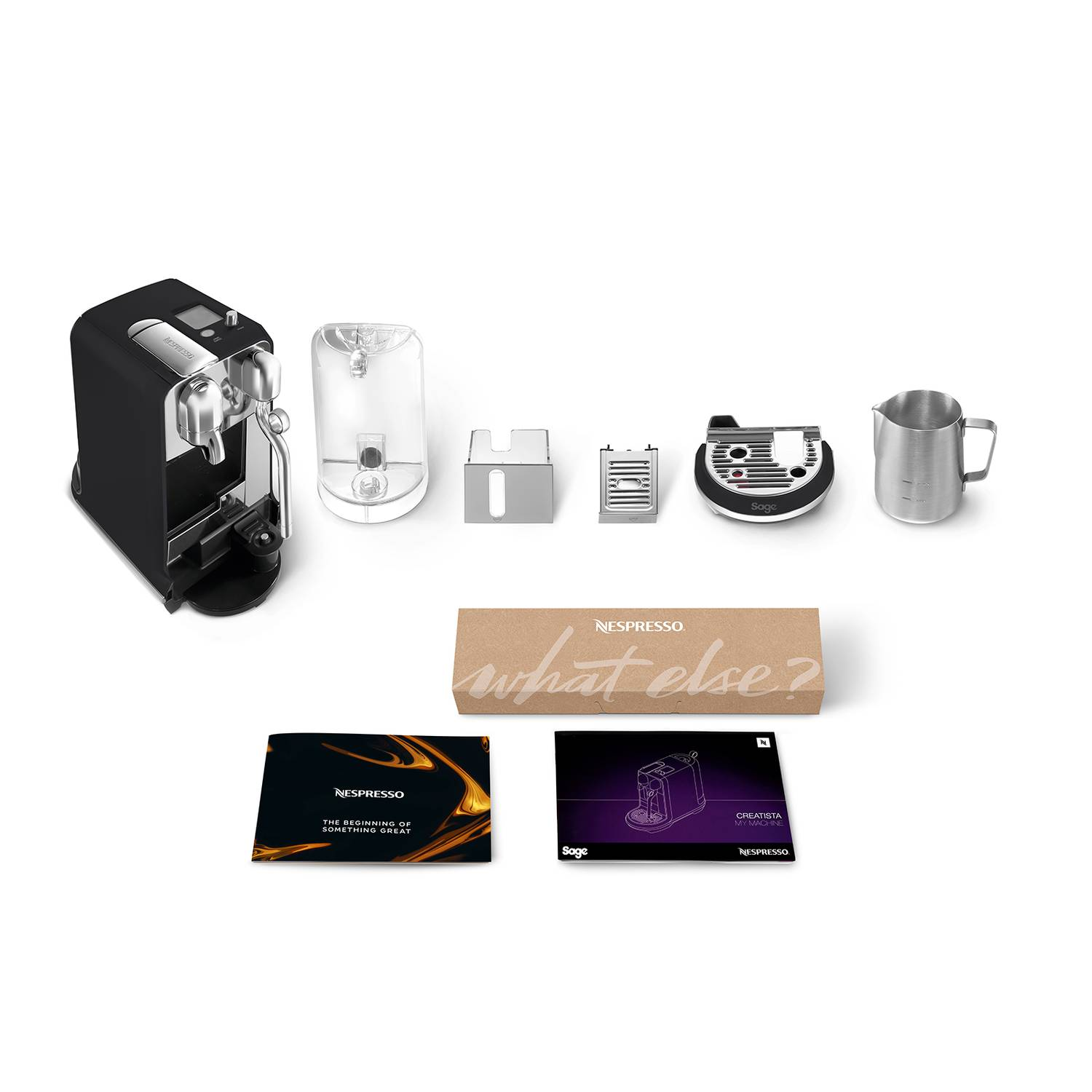 Nespresso machine and accessories are arranged on a white surface. Includes coffee maker and accessories.