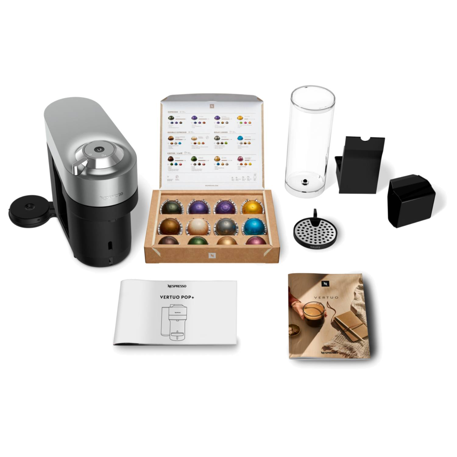 A coffee machine set includes the machine, capsules, accessories, and guides.