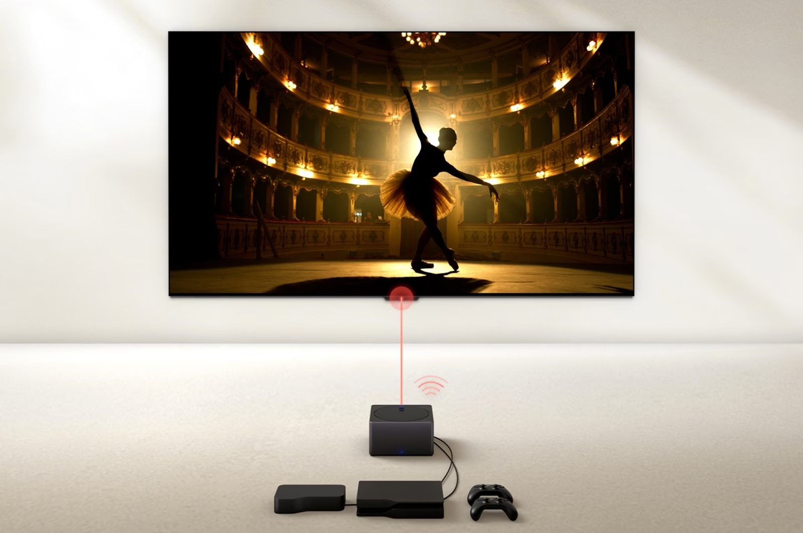 Baletnica na ekranie telewizora LG OLED, z dekoderem i konsolami do gier na pierwszym planie.