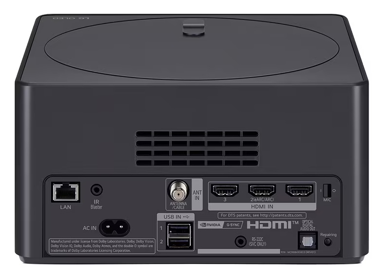 Tył czarnego dekodera LG OLED, pokazujący różne porty, takie jak LAN, HDMI i USB.