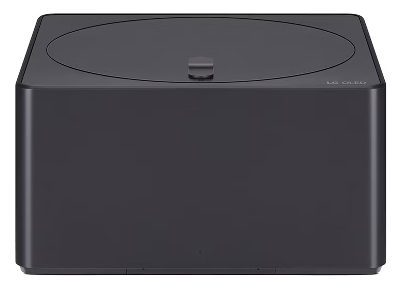 Czarny, kwadratowy dekoder LG OLED z okrągłą pokrywą i centralnym przyciskiem zasilania.