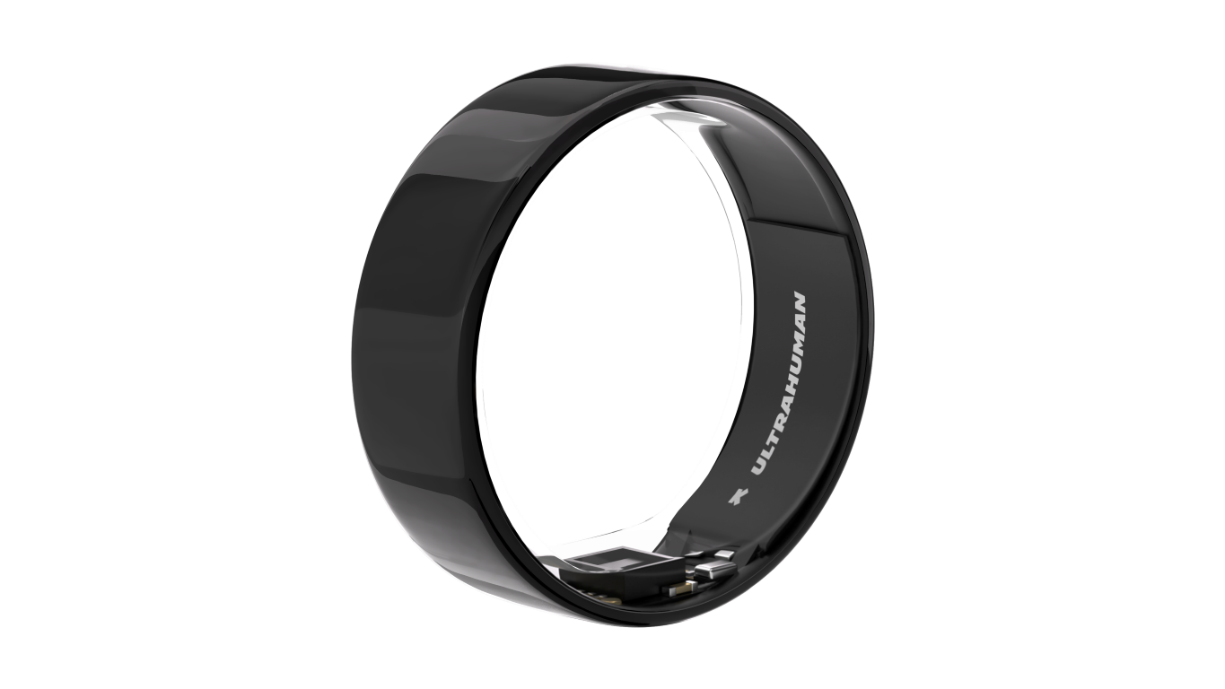 Czarny pierścień ze słowem 'ULTRAHUMAN' wewnątrz. Czarne tło.