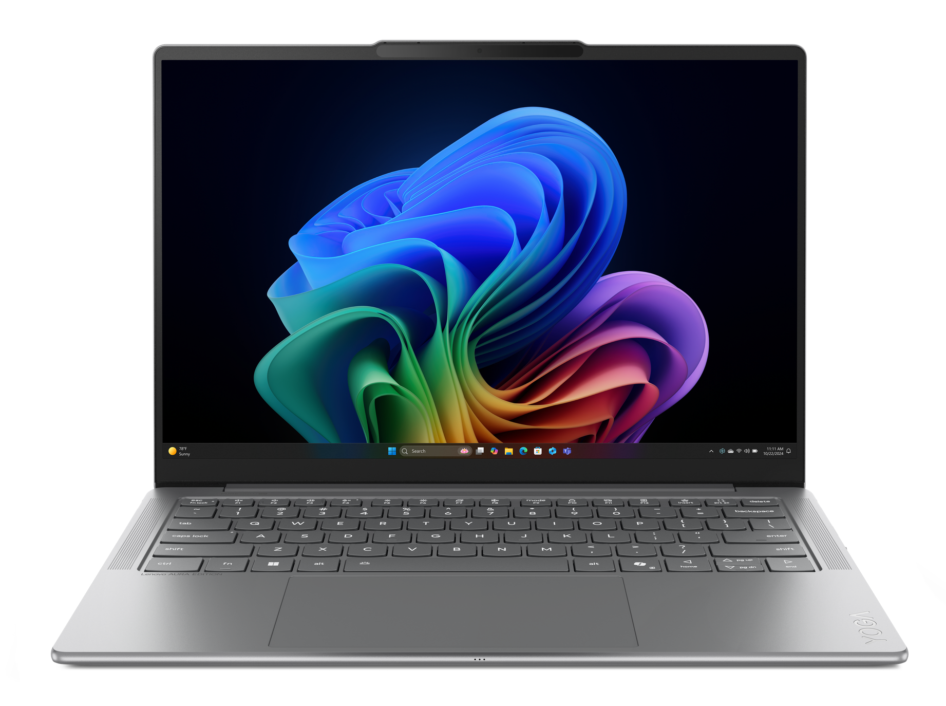 Srebrny laptop otwarty, pokazujący kolorowe, abstrakcyjne tło.