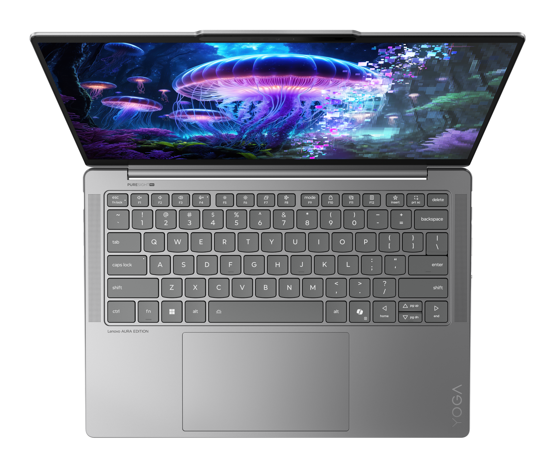 Otwarty srebrny laptop, scena z meduzami na ekranie, widoczna klawiatura, Lenovo Yoga.