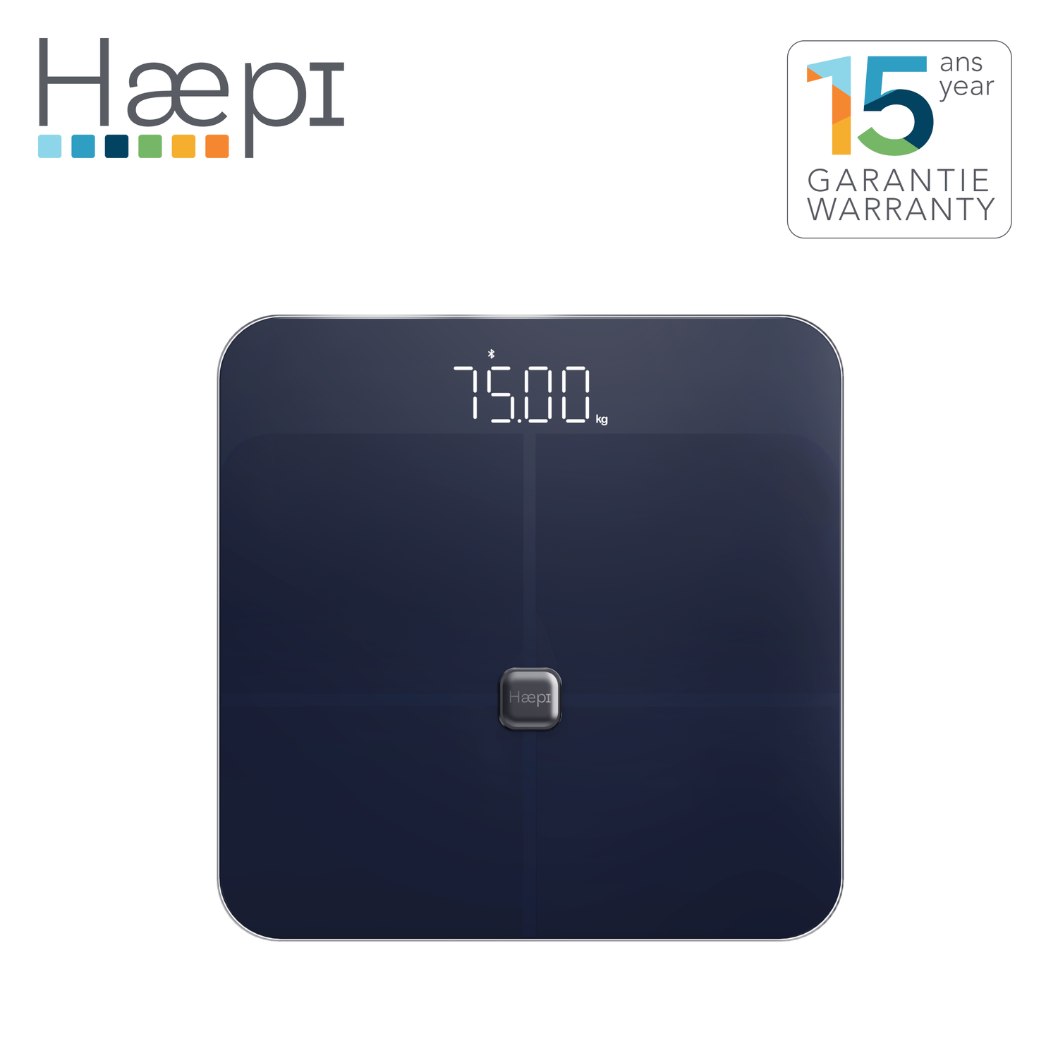 A dark blue digital scale displaying 75.00 kg, brand logo and a 15-year warranty sticker.