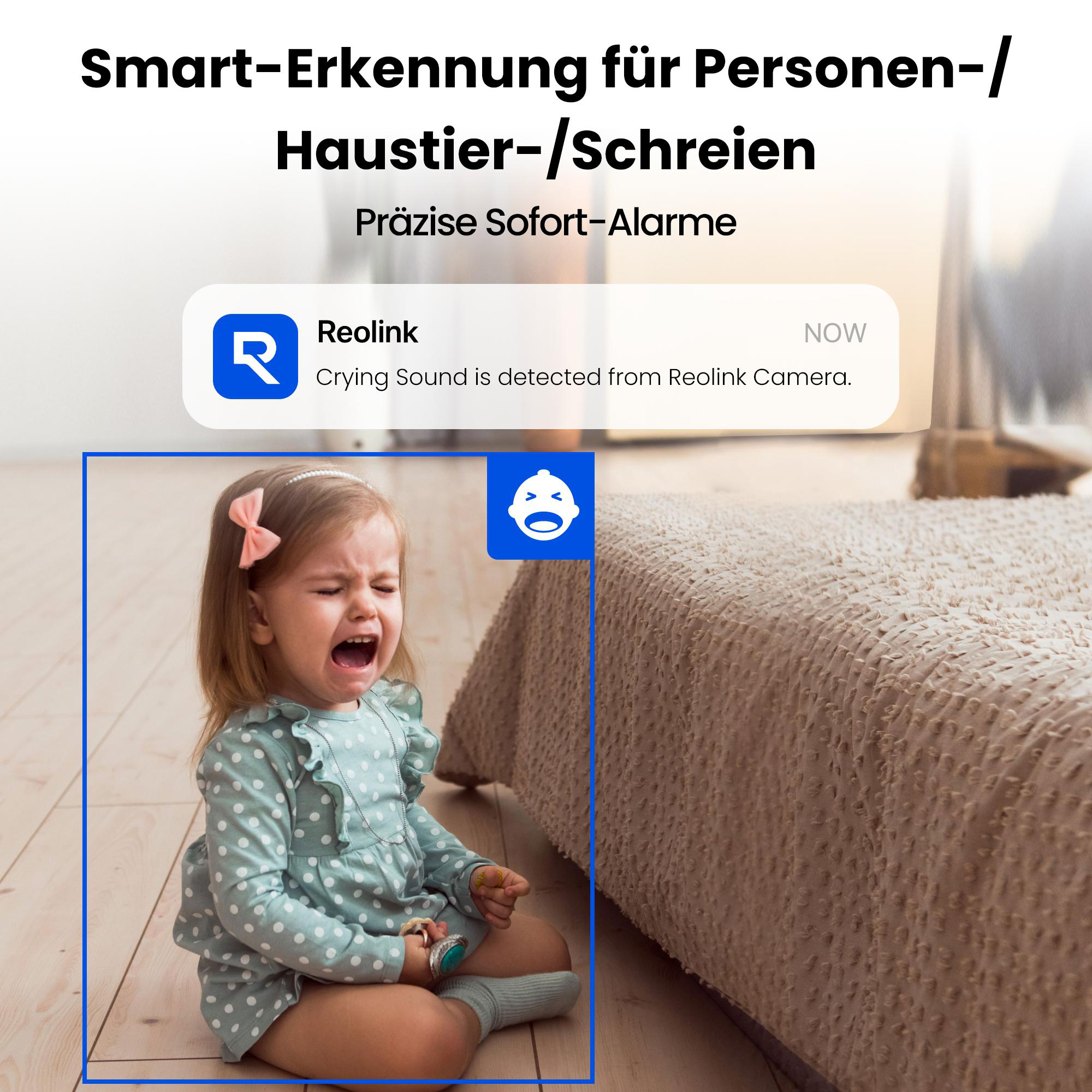Ein weinendes Kind in blauem Outfit. Eine Benachrichtigung auf dem Telefon zeigt an, dass ein Geräusch erkannt wurde.