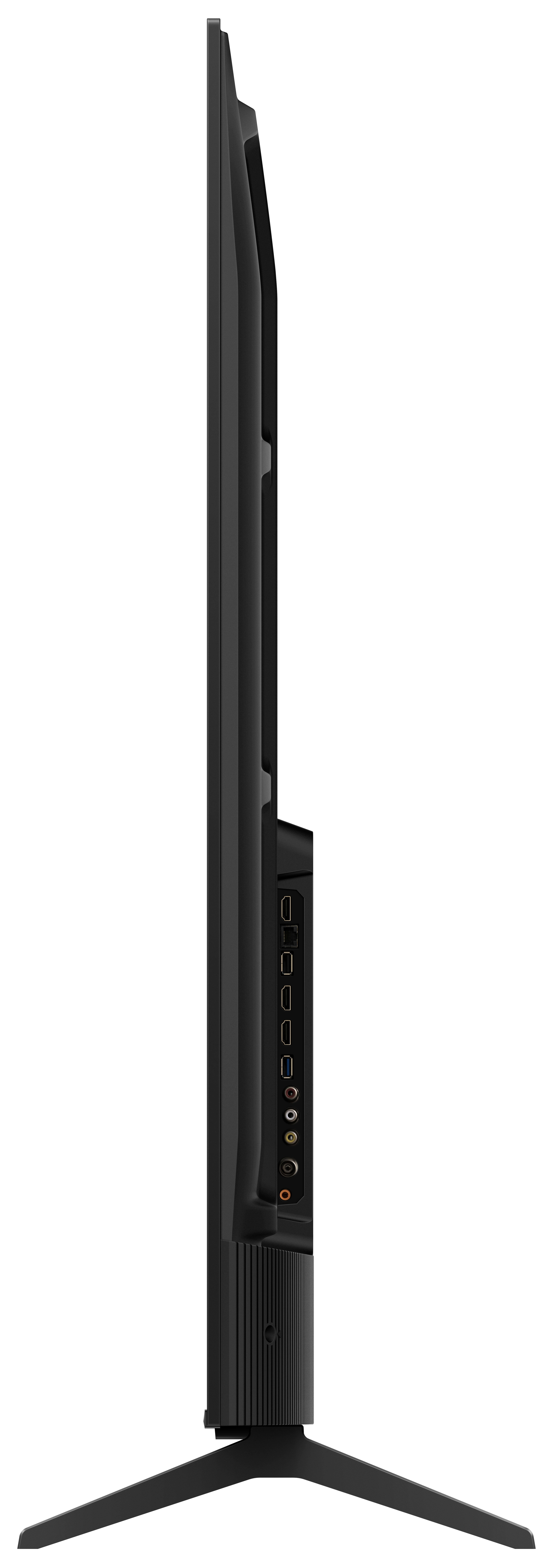 Widok z boku czarnego telewizora na czarnym tle, pokazujący jego smukły profil, porty i podstawę.