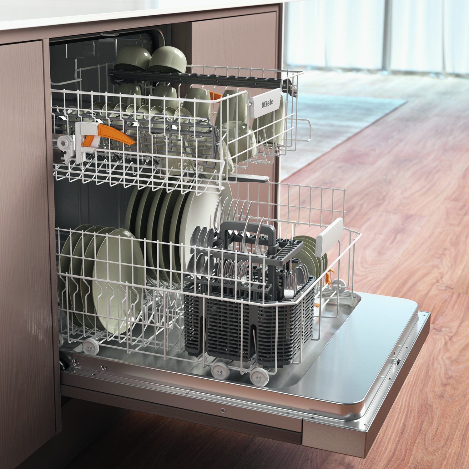 Lavastoviglie con porta aperta. All'interno ci sono piatti e utensili. Lo sfondo è una cucina.
