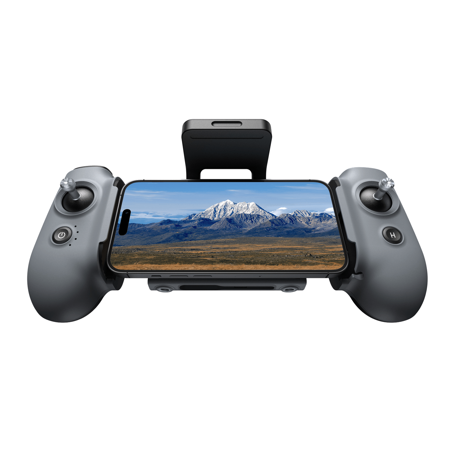 Manette de drone avec téléphone affichant une vue sur la montagne.