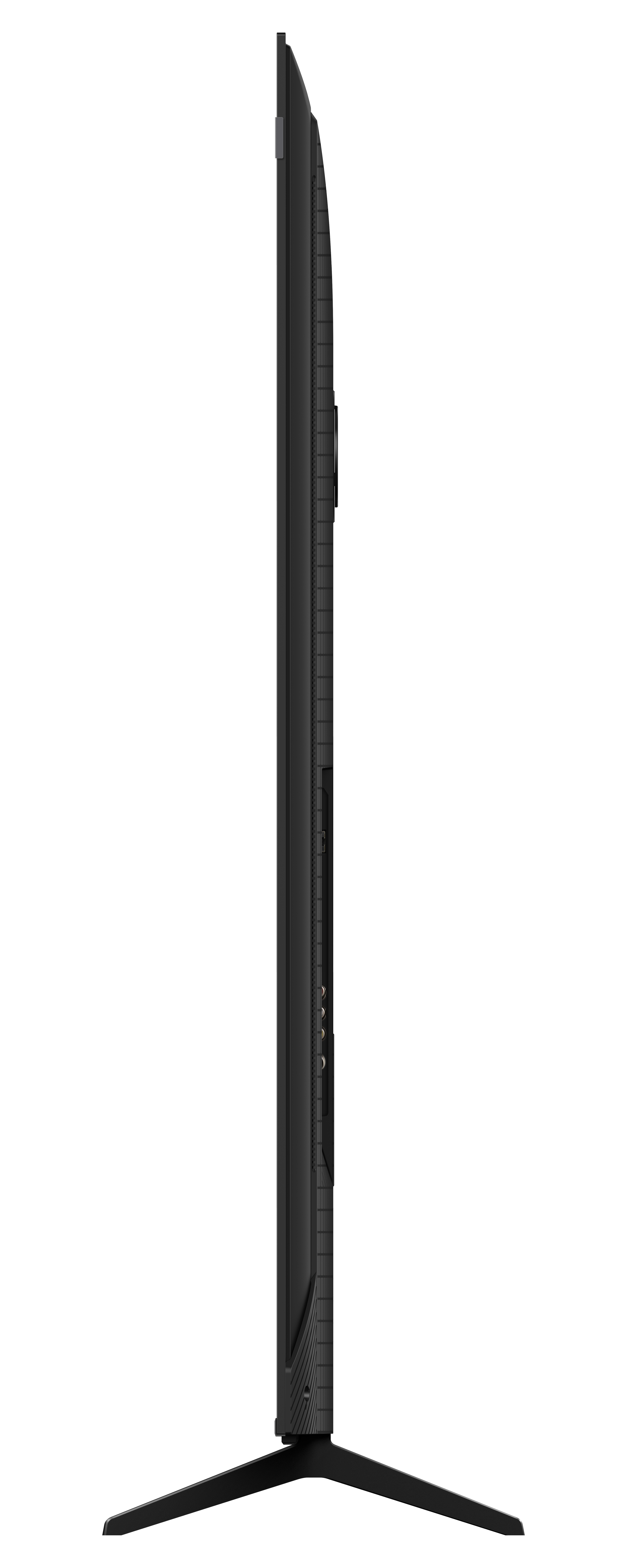 Widok z boku cienkiego, czarnego telewizora na stojaku. Ekran jest czarny, ramka wąska, podstawa w kształcie V.