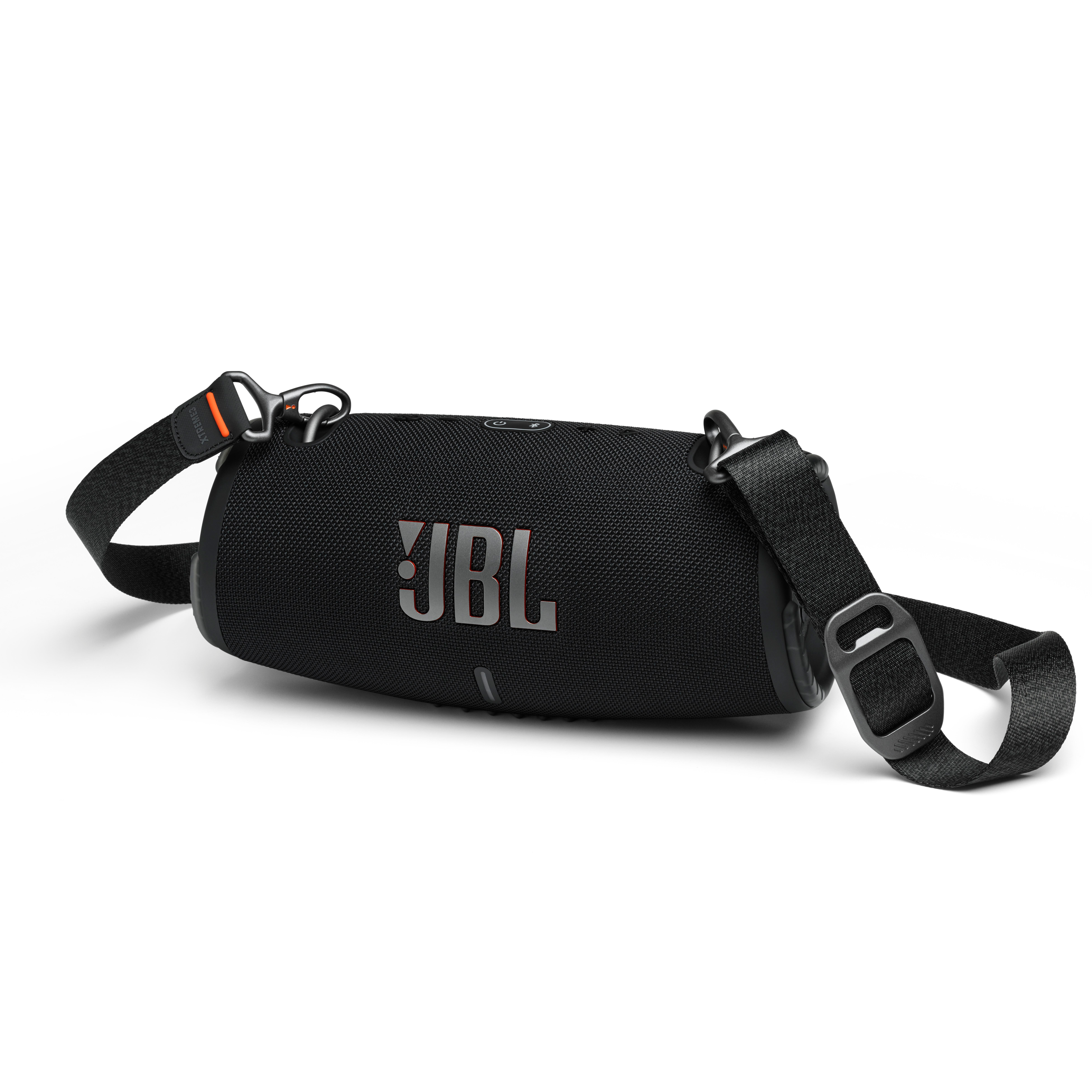 Schwarzer JBL-Lautsprecher mit Riemen, silbernem Logo, weißem Hintergrund.