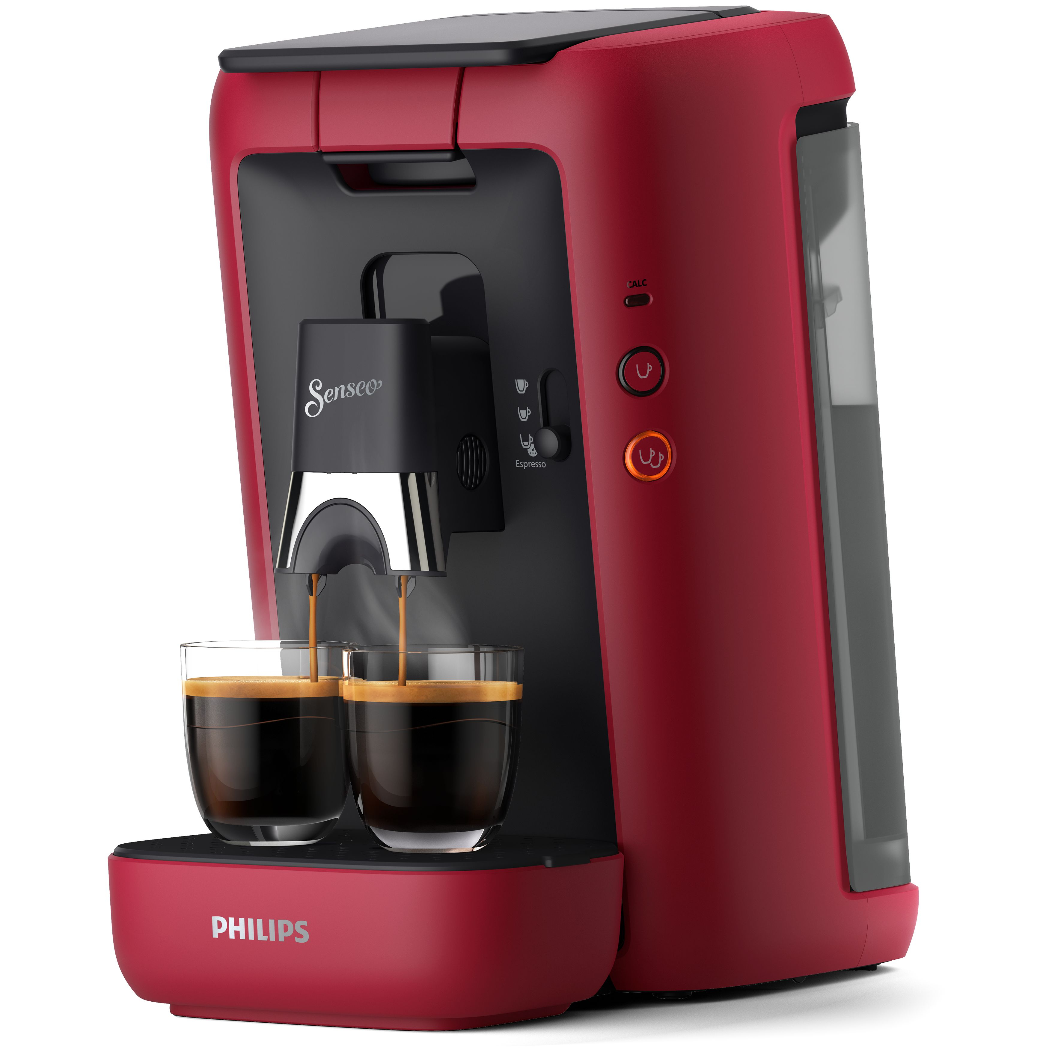 Une machine à café rouge avec deux tasses de café en cours de versement.