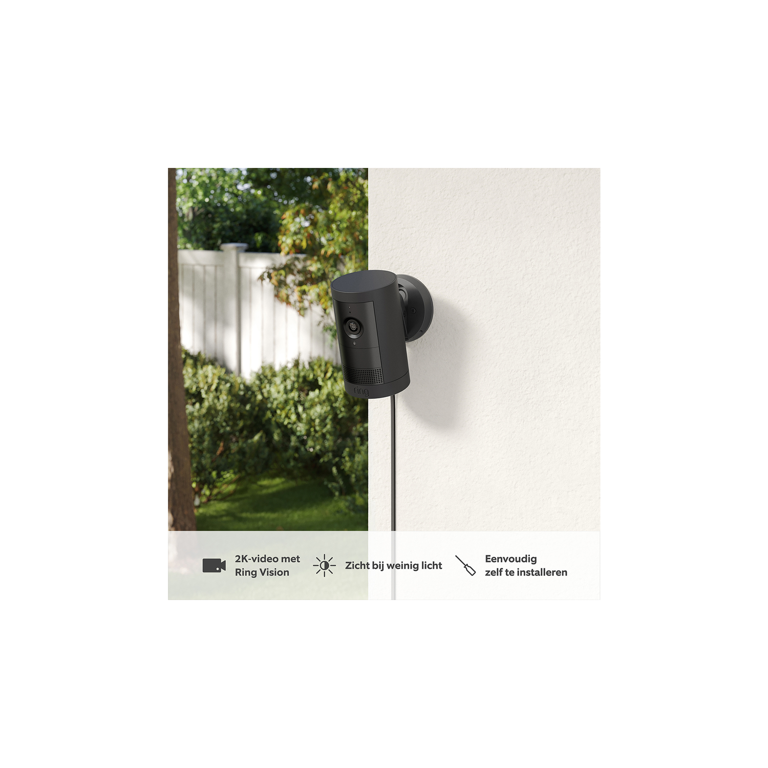 A black Ring camera is mounted on a white wall. A black cable runs down the wall. Text says "Ring Vision".
