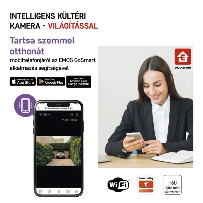 Egy nő telefont használ az EMOS GoSmart alkalmazással. A kamera egy garázst mutat.