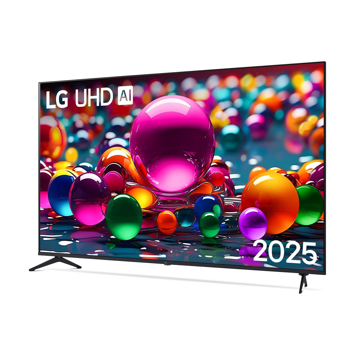 Un televisore con loghi LG e 2025 mostra sfere colorate. Ha gambe e cornice nere. Scena luminosa.