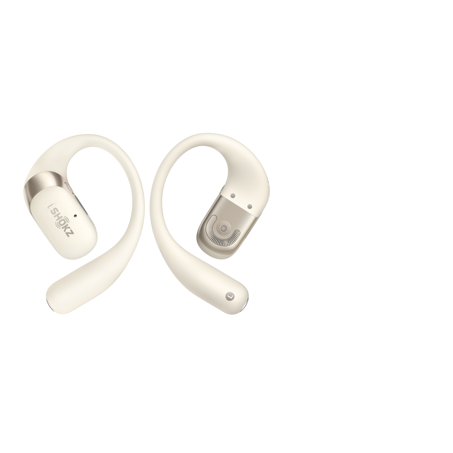 Deux écouteurs crème. Les écouteurs sont isolés sur un fond noir uni.