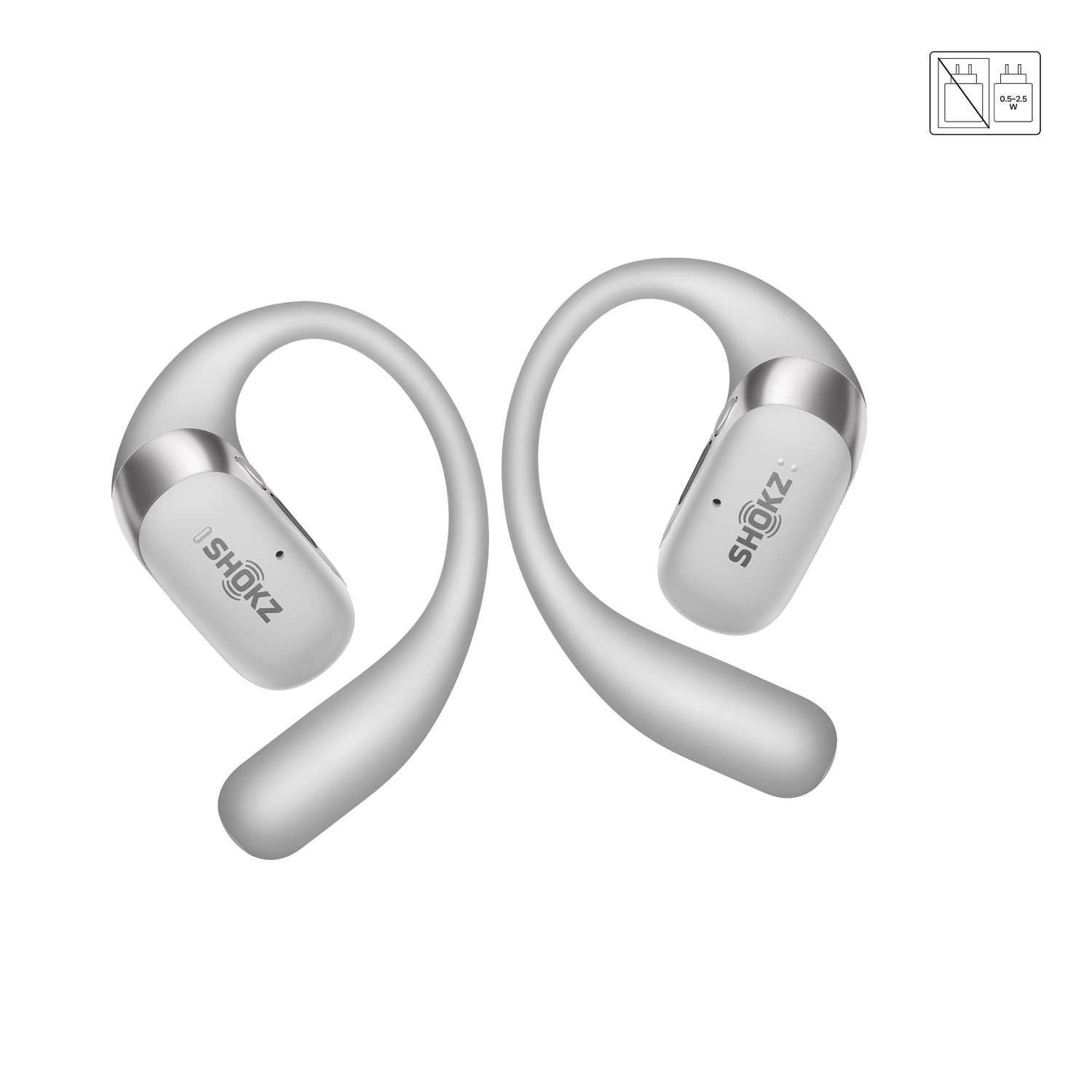 Two white Shokz headphones, side by side, on a white surface.