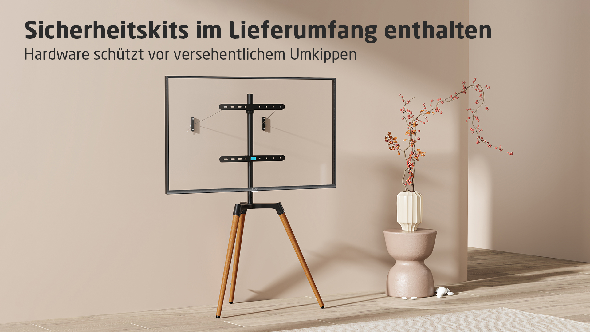 Un support TV avec des pieds en bois supportant un cadre noir avec une TV. Le texte dit "Sicherheitskits im Lieferumfang enthalten".