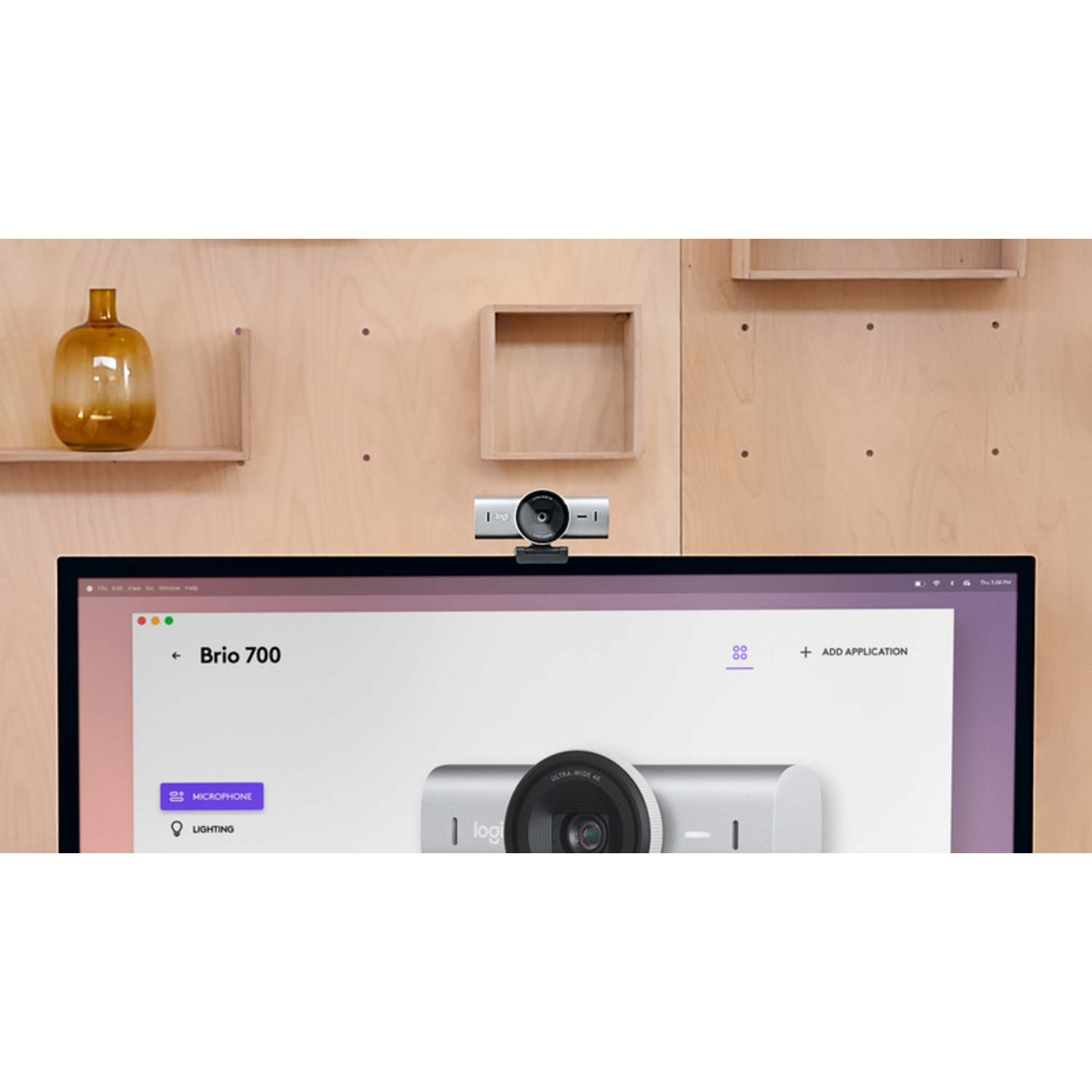 A webcam on top of a computer monitor.