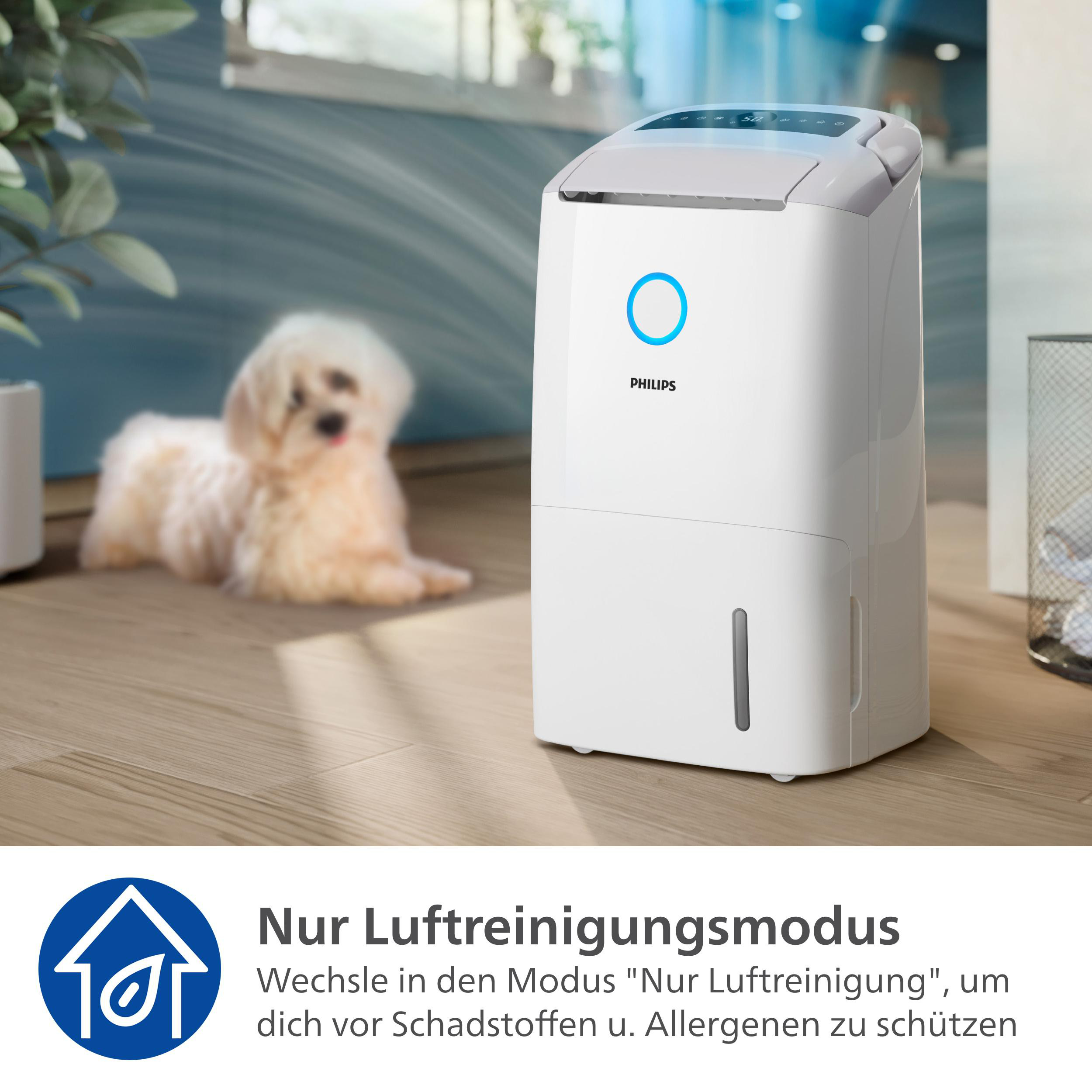 Ein weißer Luftreiniger in einem Raum mit einem Hund. Es hat ein blaues Ringlicht und das Wort Philips.