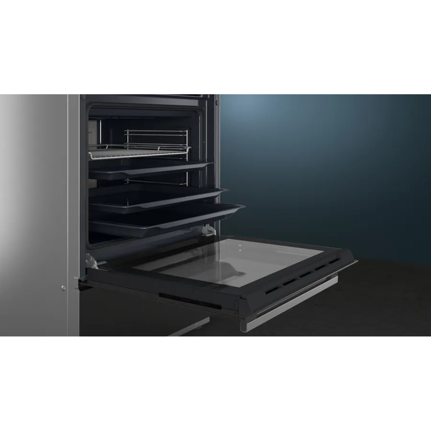 An open oven with trays inside. The oven is black, and the trays are placed on a rack.