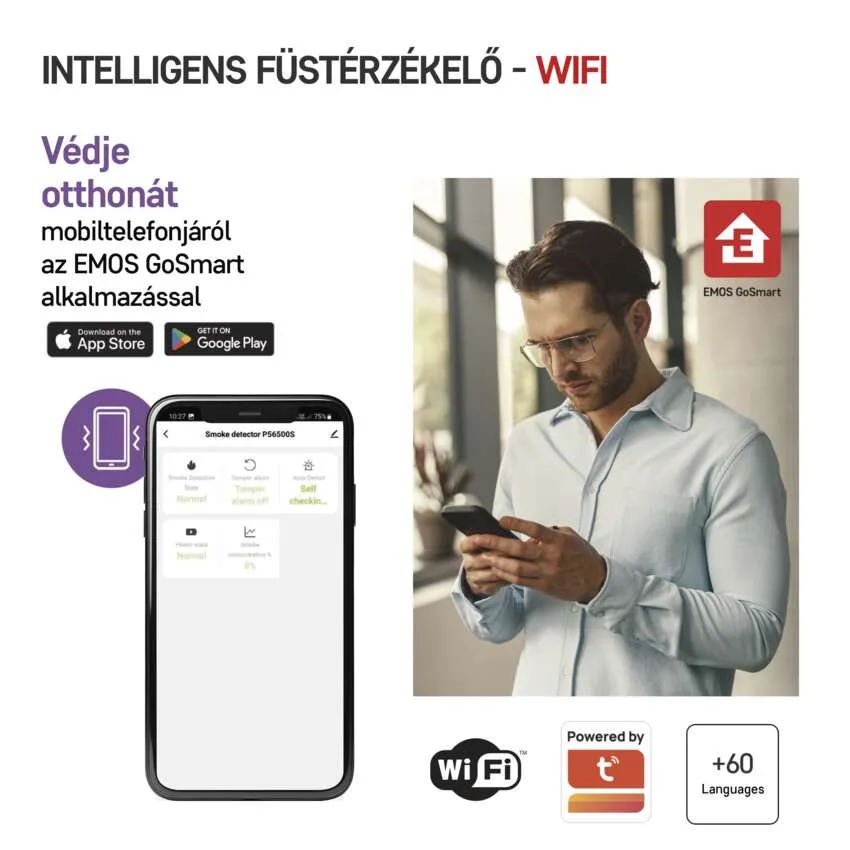 Egy férfi okostelefont használ az EMOS GoSmart alkalmazással. A háttérben a termék csomagolása látható.